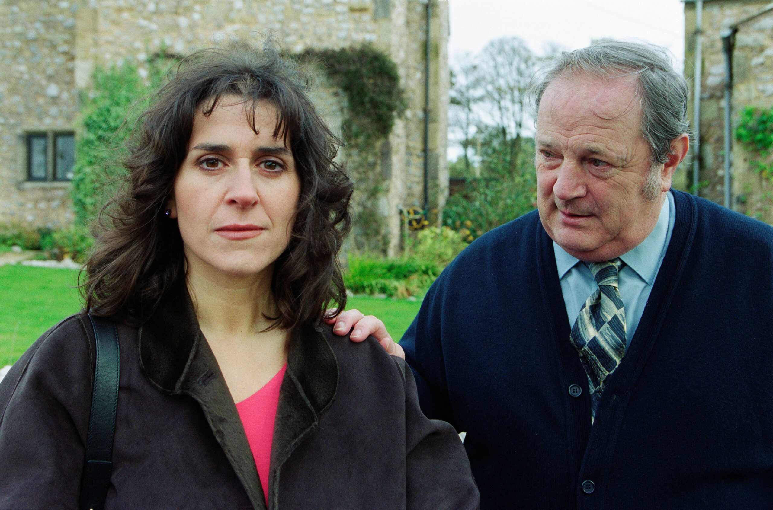 Elsa Feldmann looks worried as Alan Turner puts a hand on her shoulder