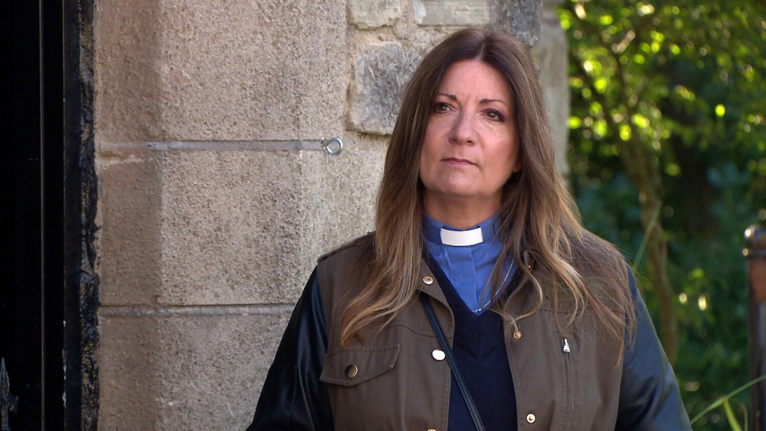 Harriet looks suspicious as Charles receives a text in Emmerdale