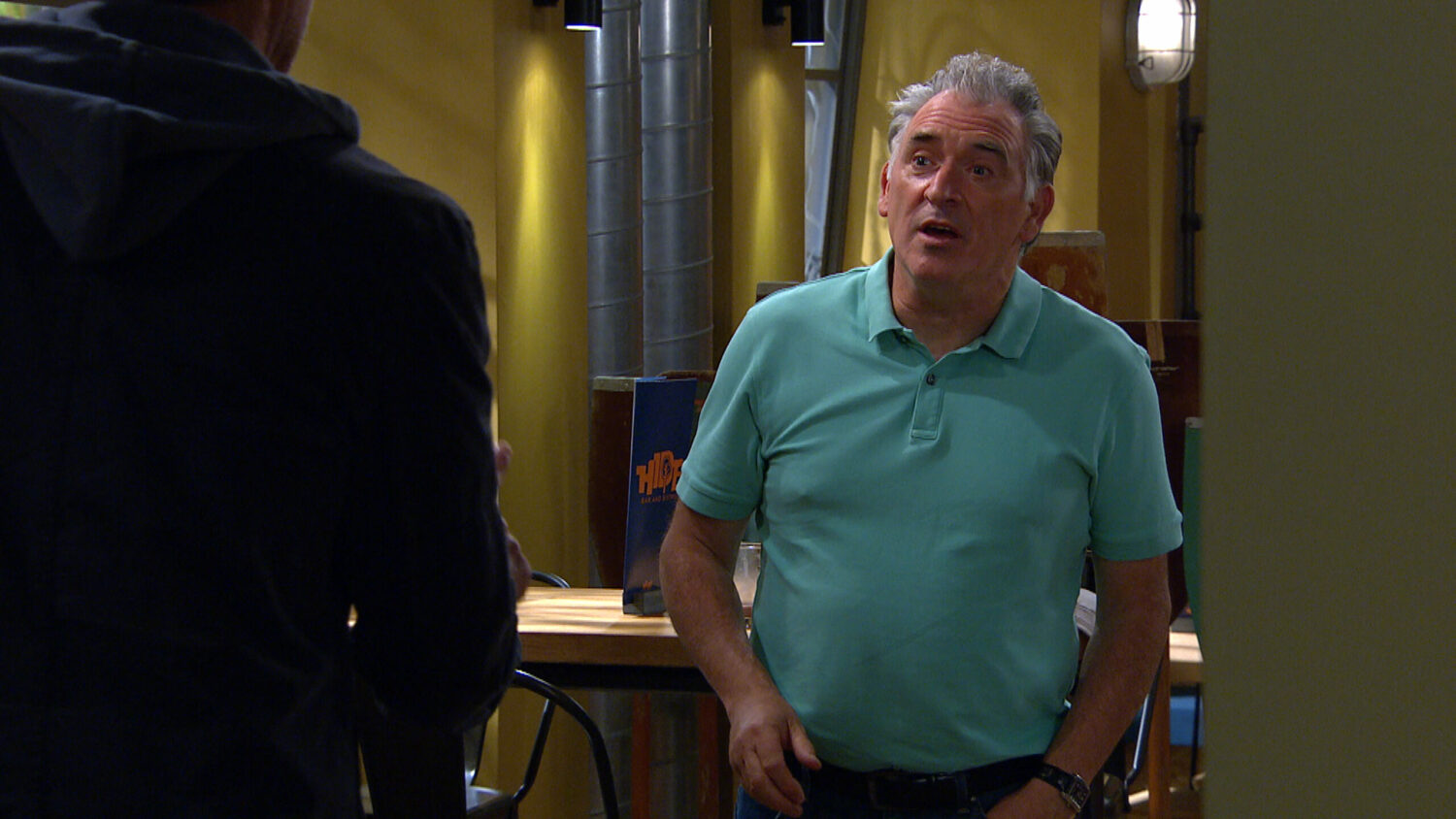 Bob looks concerned as he talks to Marlon in Emmerdale