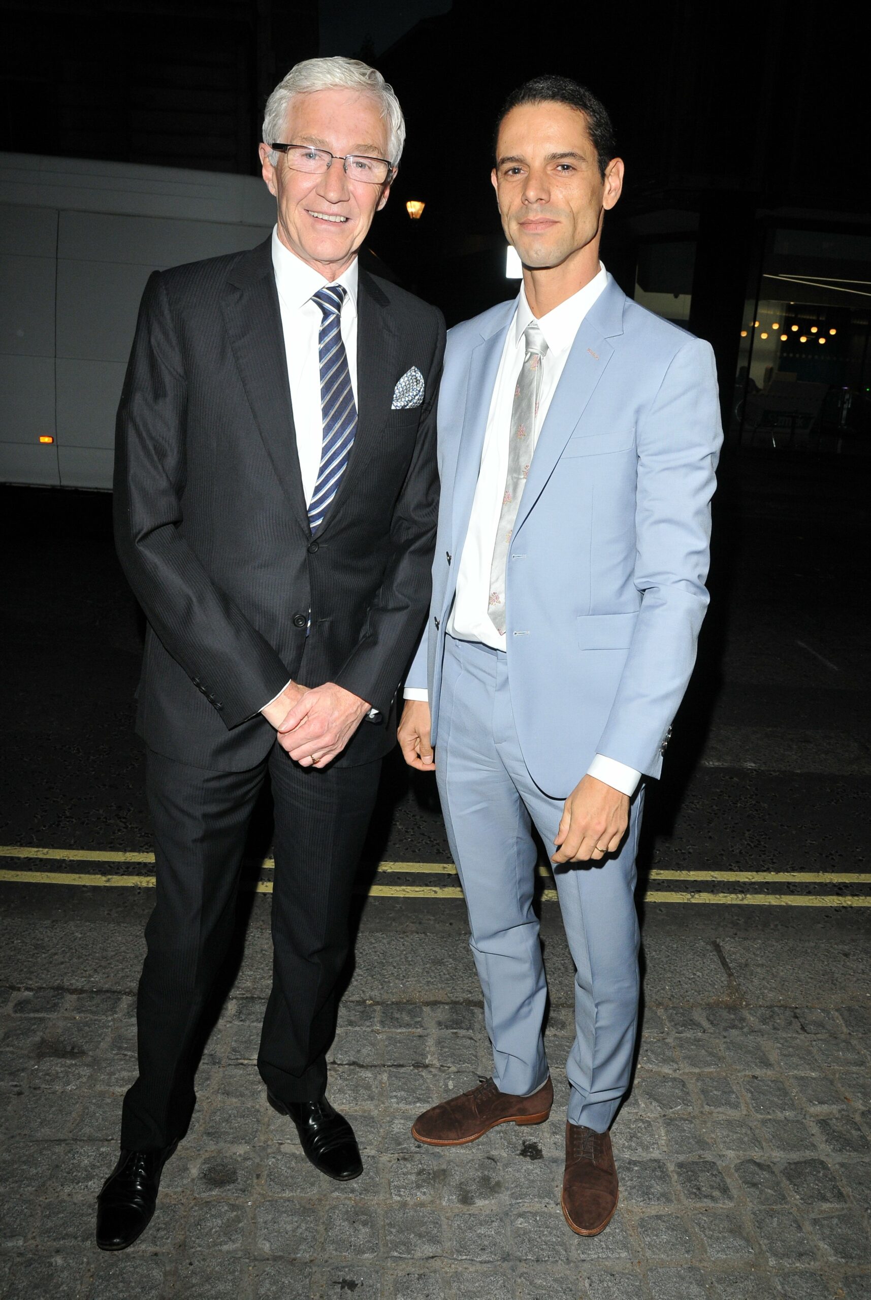 Paul and his husband Andre Portasio at the Royal Opera House smiling