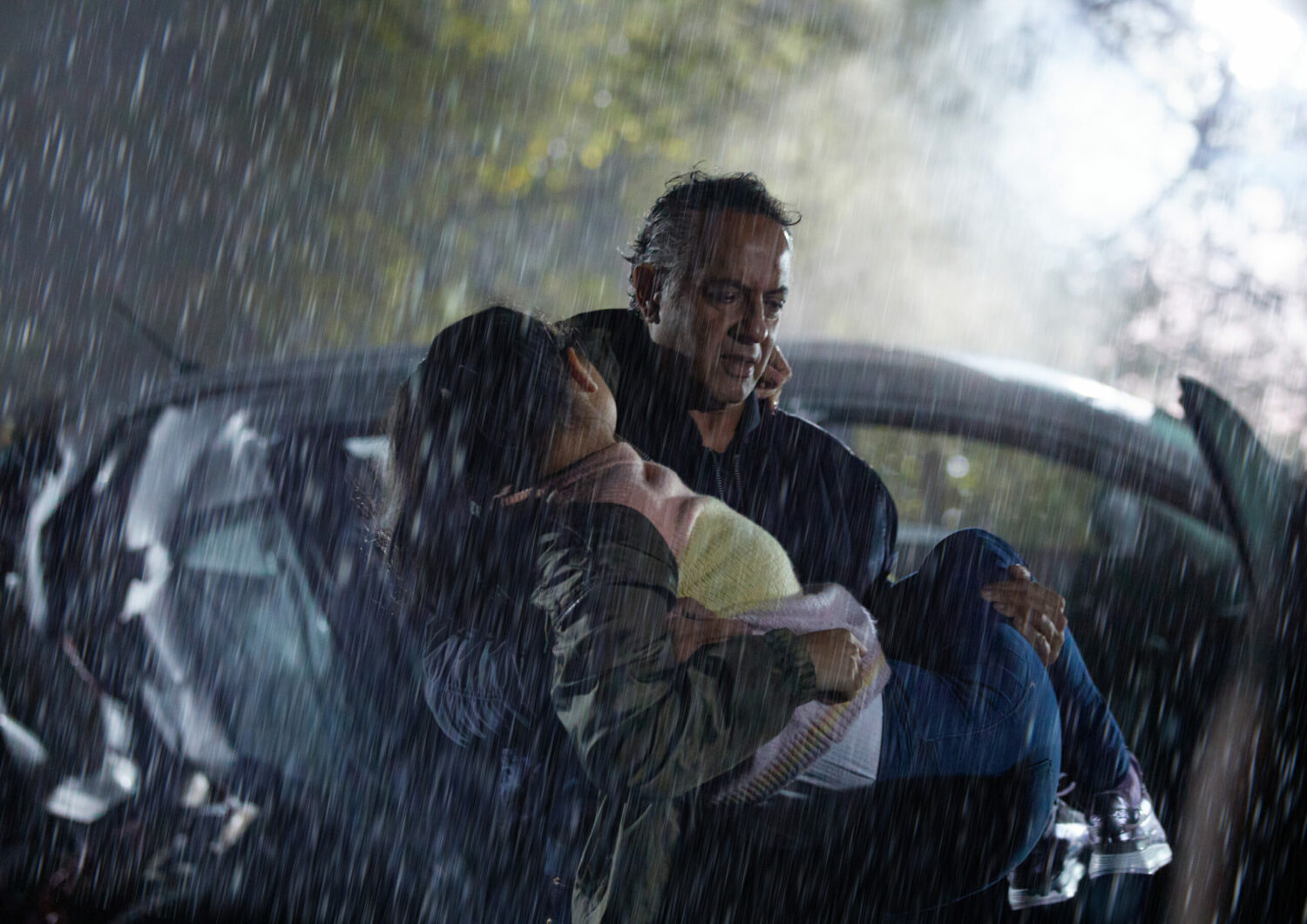 Coronation Street: Dev saves Asha from the car in the pouring rain