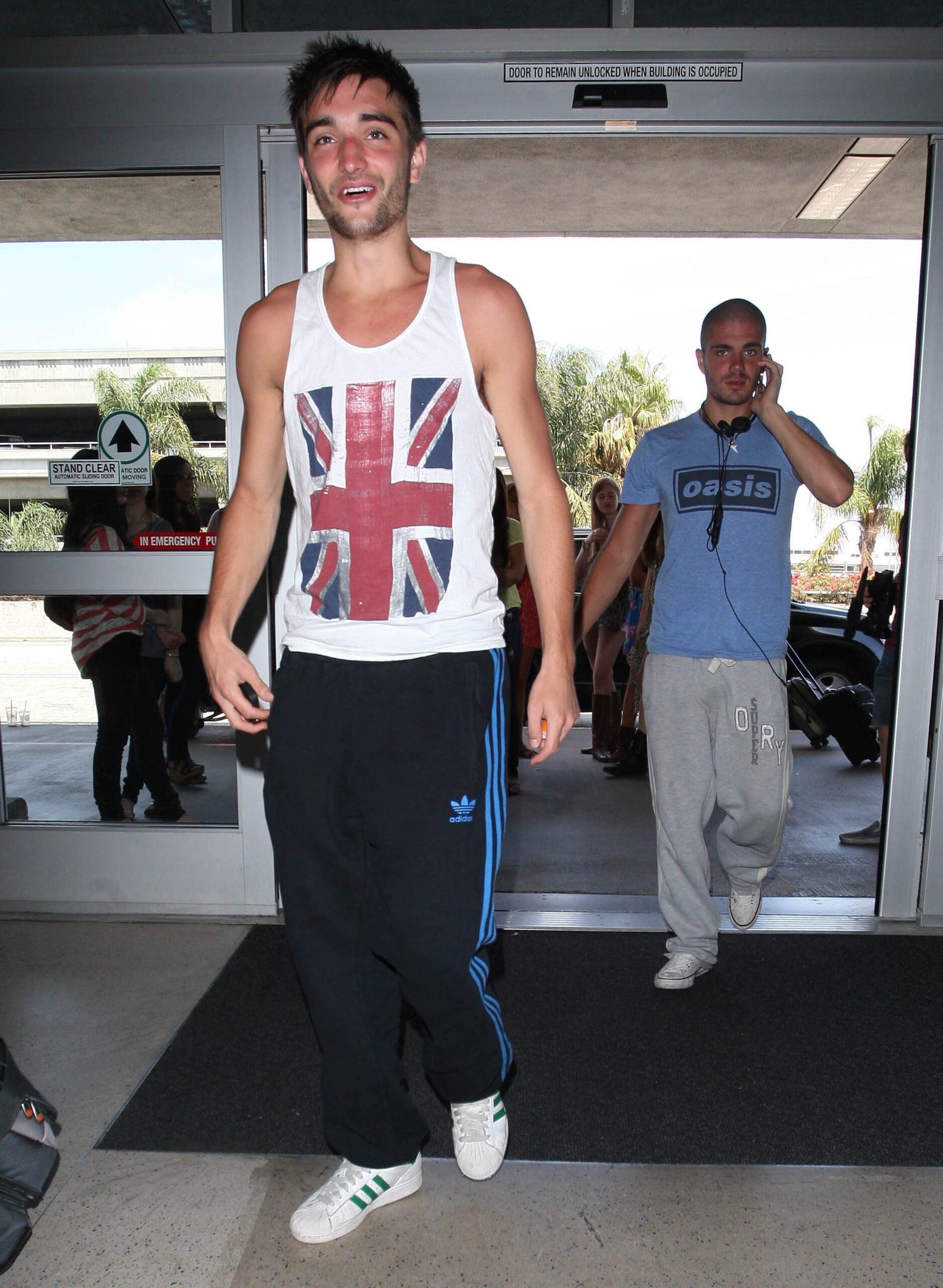 Who is Tom Parker? The Wanted arrive in Los Angeles