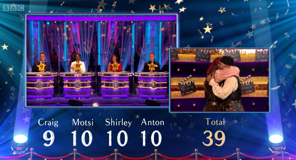 Strictly Come Dancing John and Johannes hug as they receive three 10s