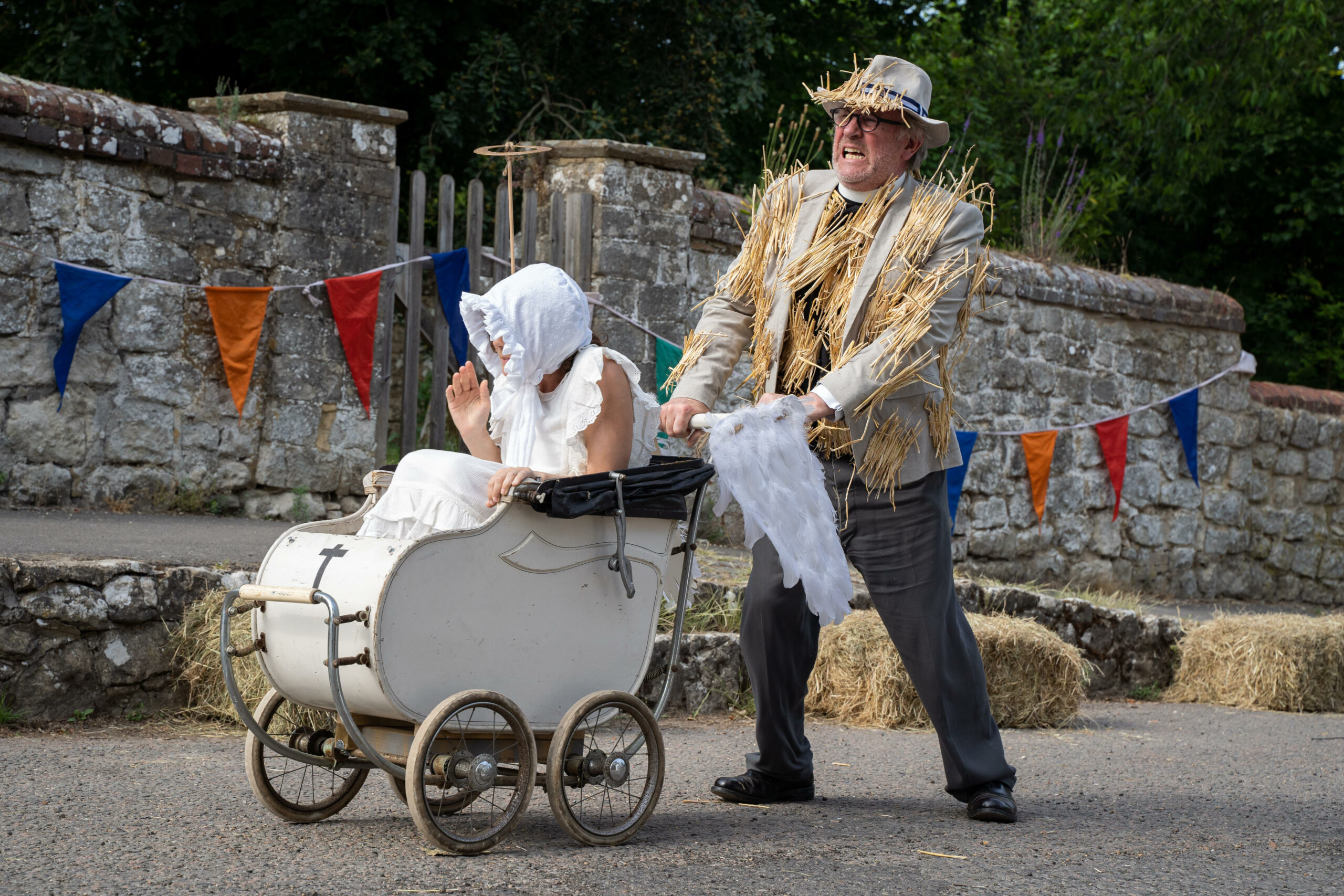 Peter Davison as the Vicar in The Larkins