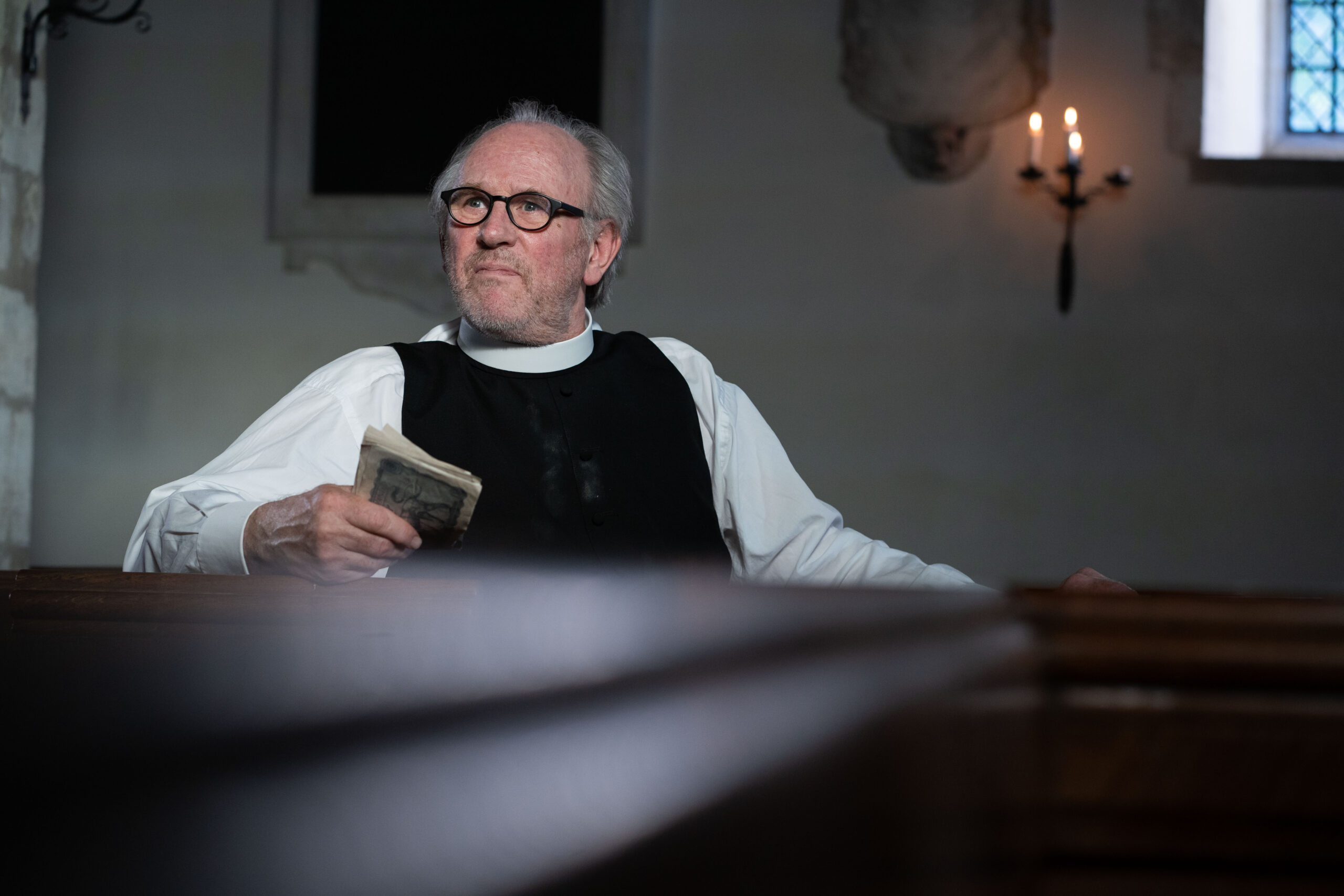 Peter Davison as the Vicar in The Larkins