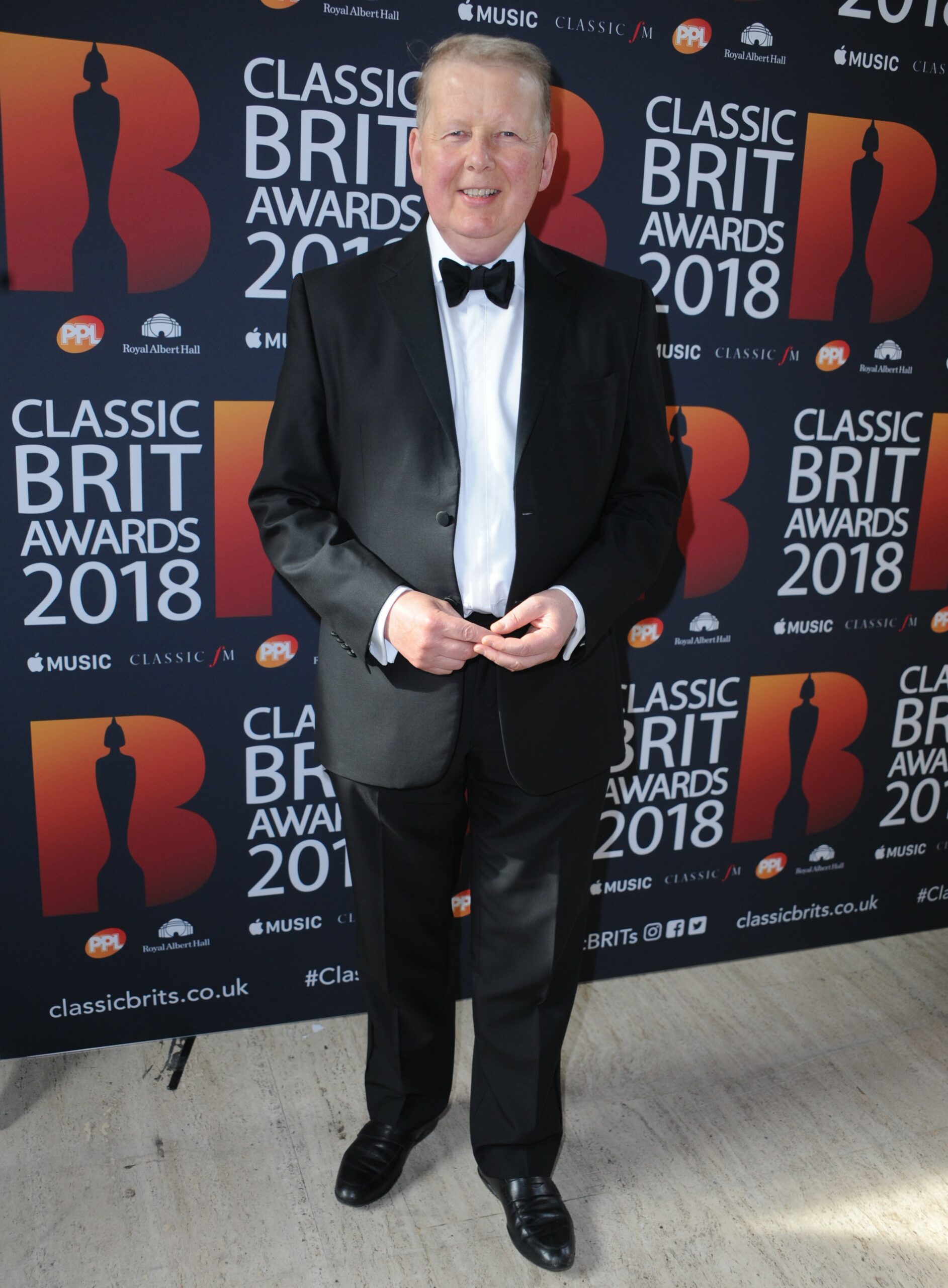 Bill Turnbull smiles on red carpet