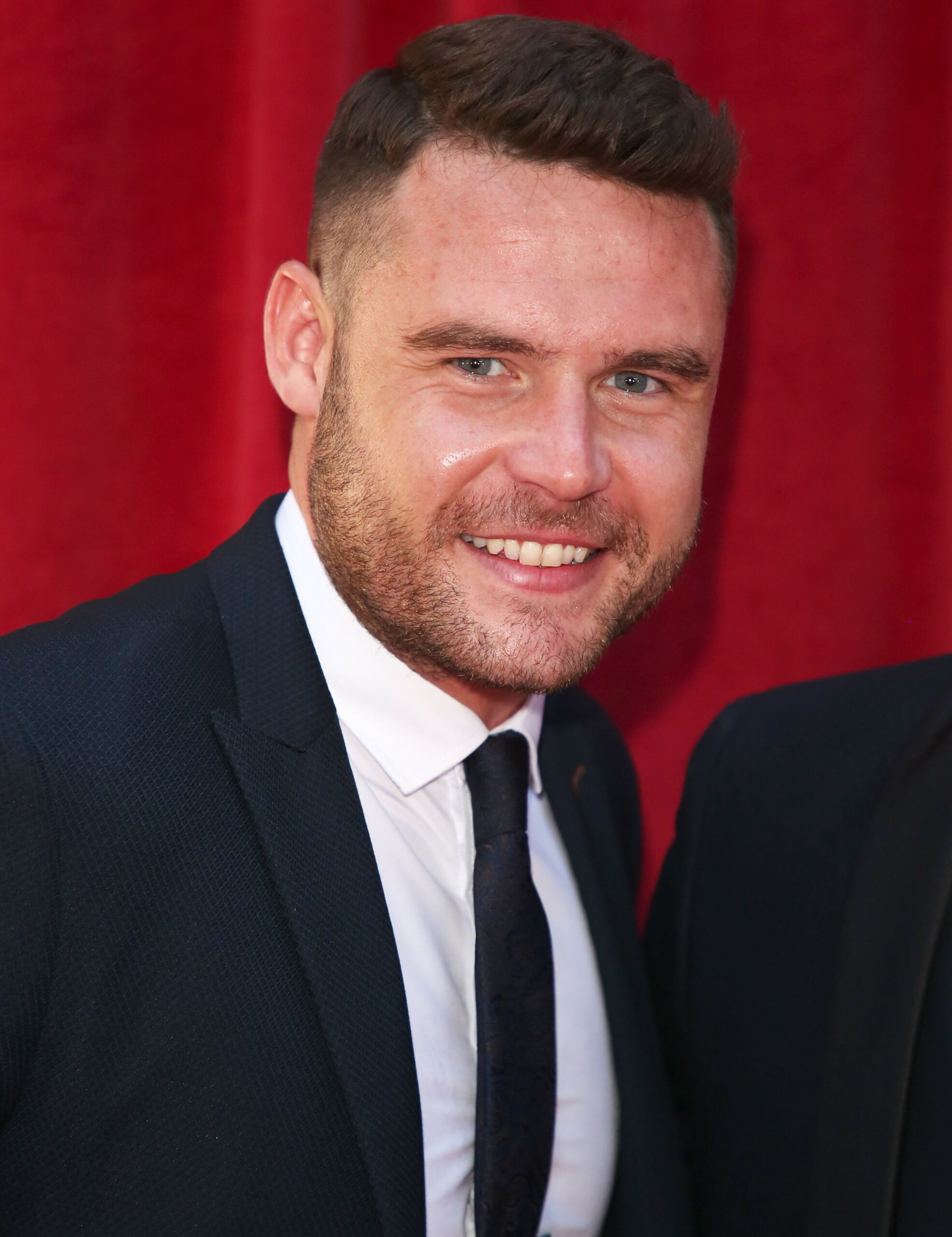 Danny Miller smiles at soap awards
