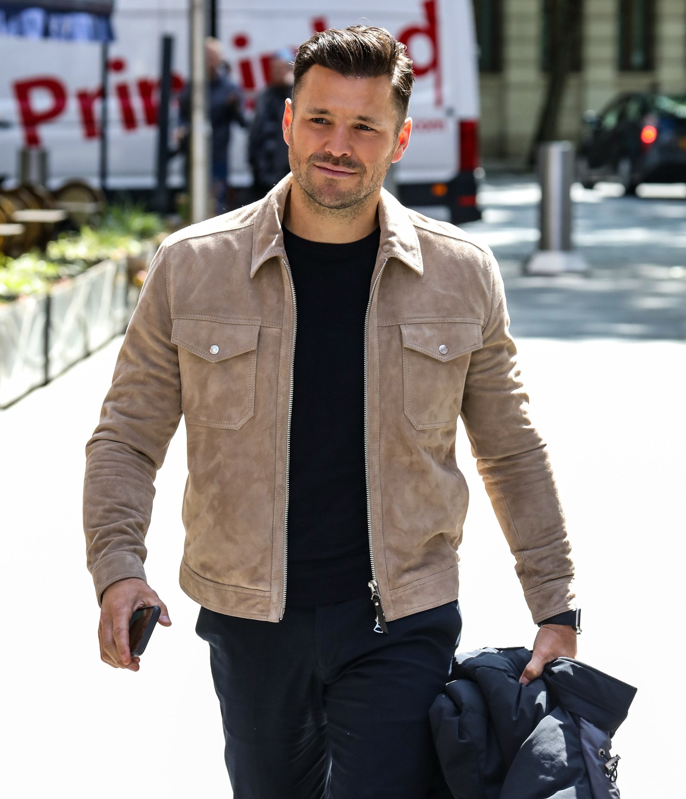 Mark Wright smiles outside Global radio