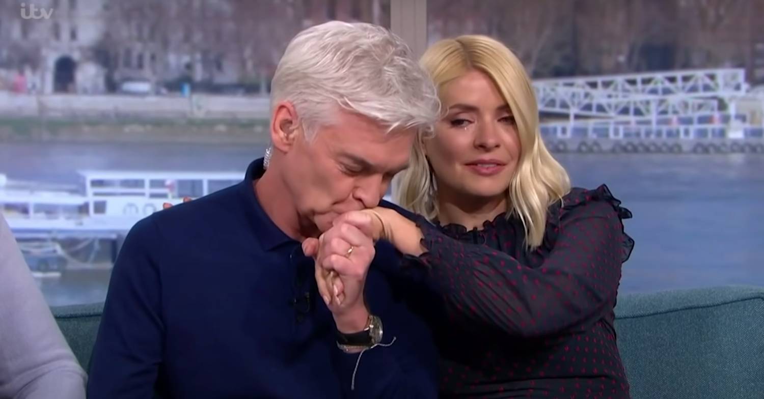 Phillip and Holly as he came out on TV in February 2020