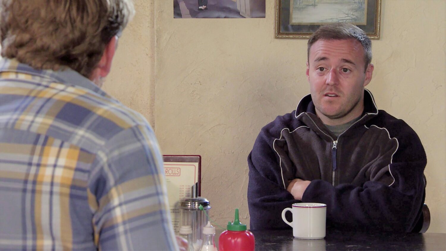 Coronation Street Tyrone Phill in cafe