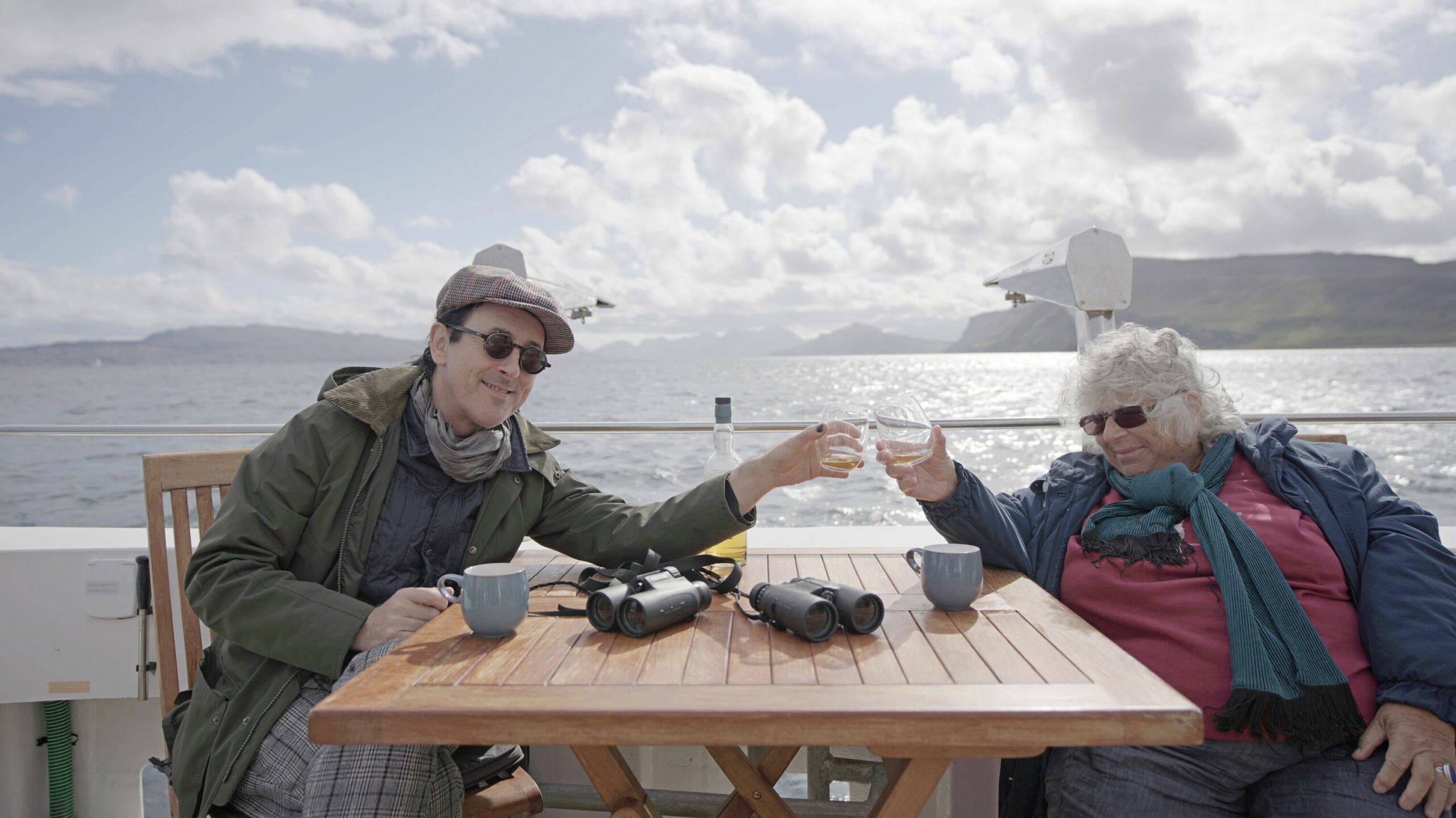 Miriam and Alan laughing on boat in Skye