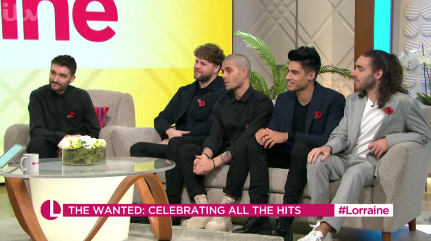 Lorraine Kelly was left red-faced today when a button on her top popped open