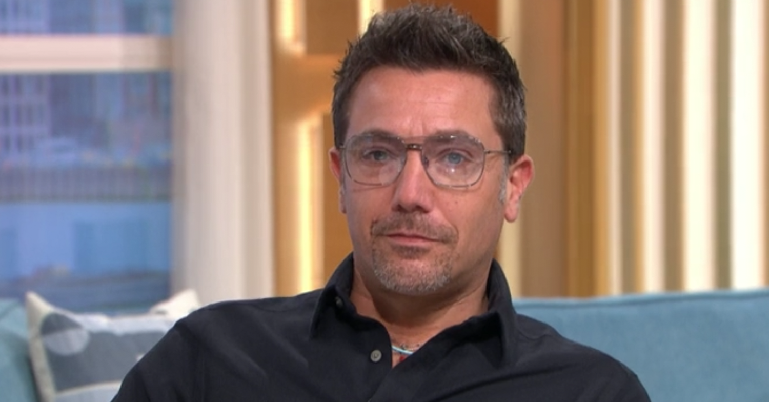 Gino D'Acampo smiling on the This Morning sofa
