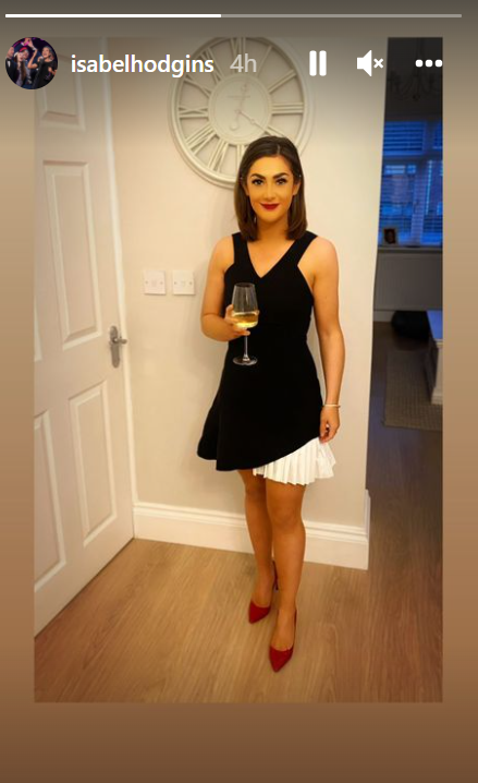 Isabel Hodgins looks glamorous in black dress and red lipstick on her Instagram Stories
