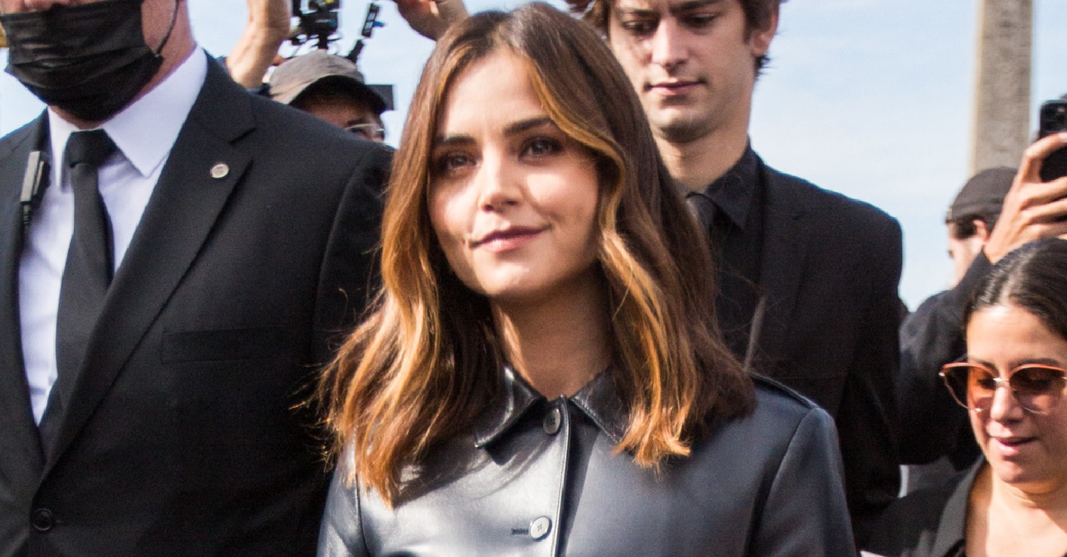 jenna coleman smiles on the red carpet splash