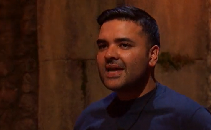 I'm A Celebrity Naughty Boy smiles as he prepares to take on the trial