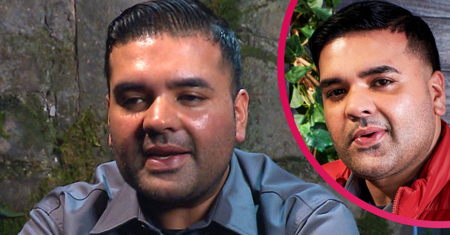 Naughty Boy in a blue top, talking in the Bush Telegraph on I'm A Celeb