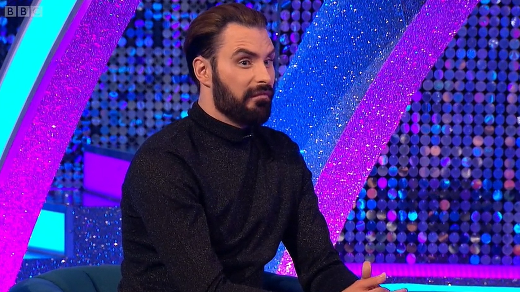 Rylan Clark in black jumper on It Takes Two as fans spot reddish hair