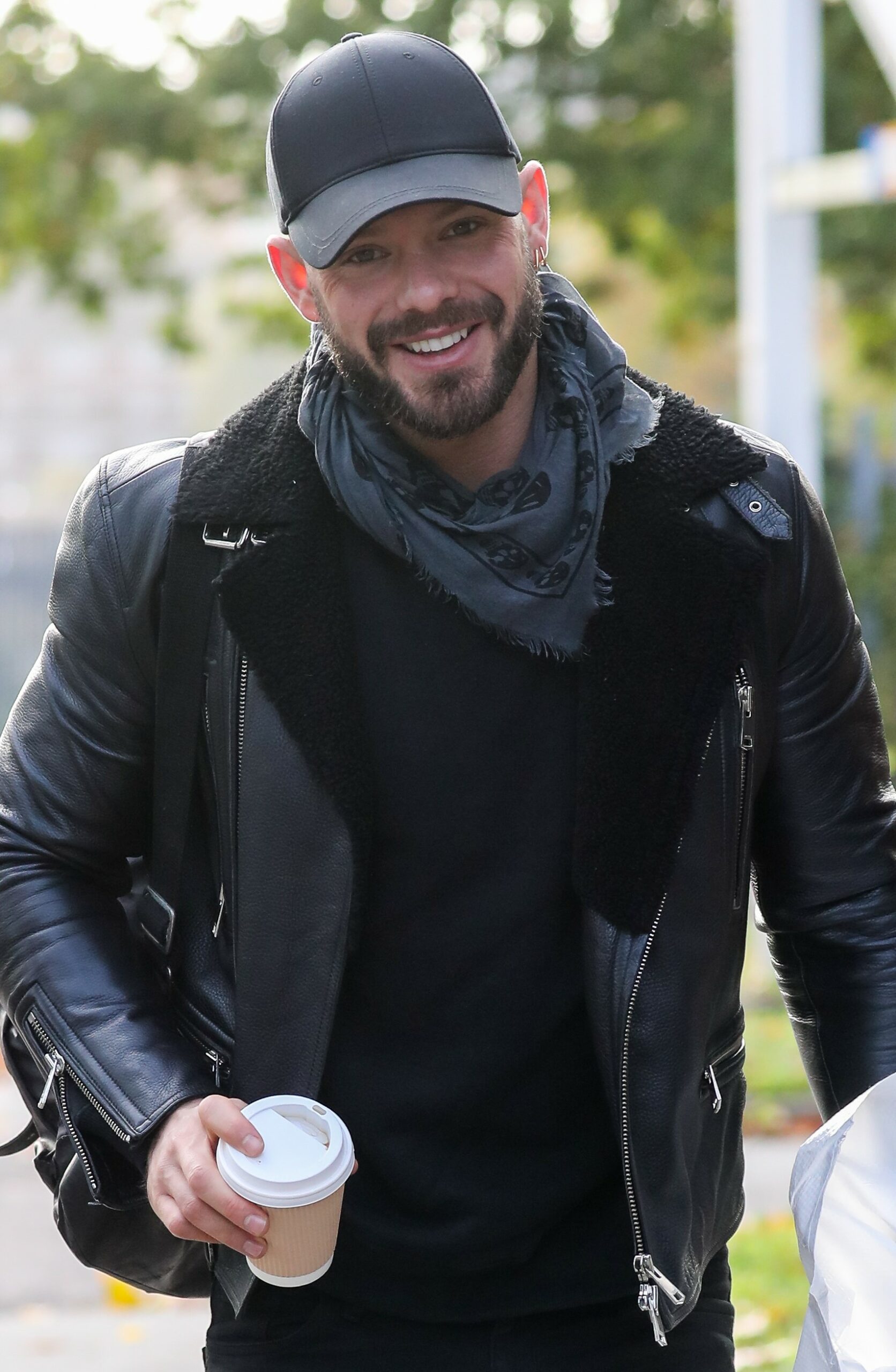 Strictly star John Whaite smiles for cameras