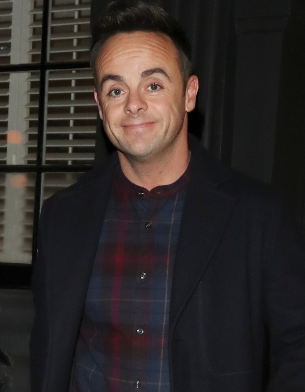 Ant McPartlin smiles for cameras
