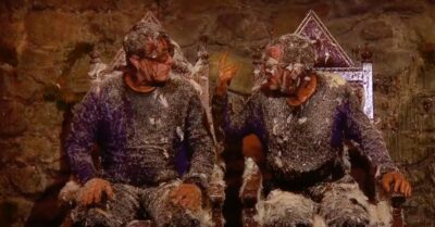 Adam Woodyatt and Simon Gregson covered in feathers on I'm A Celebrity