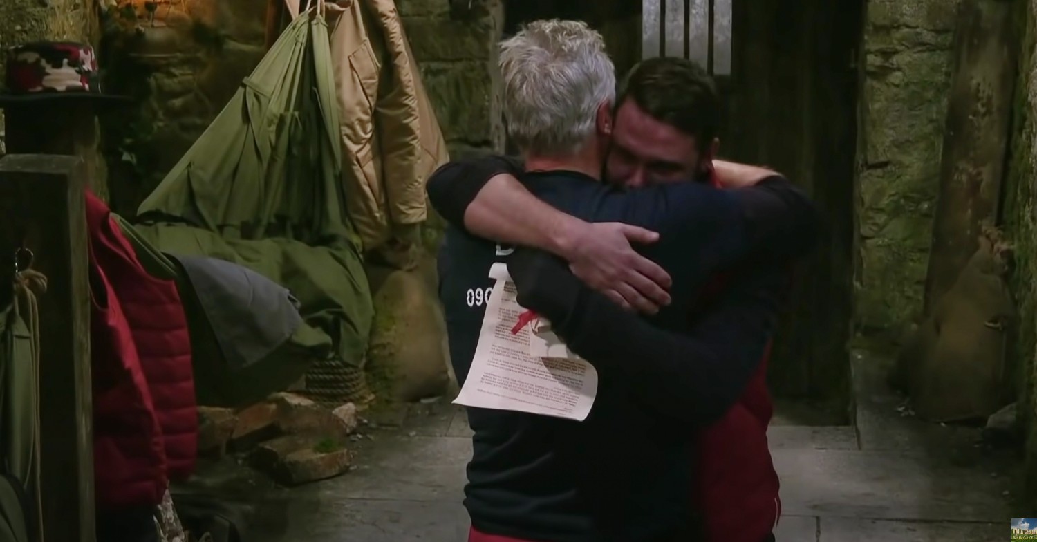 danny miller hugging david ginola on i'm a celebrity after letters from home