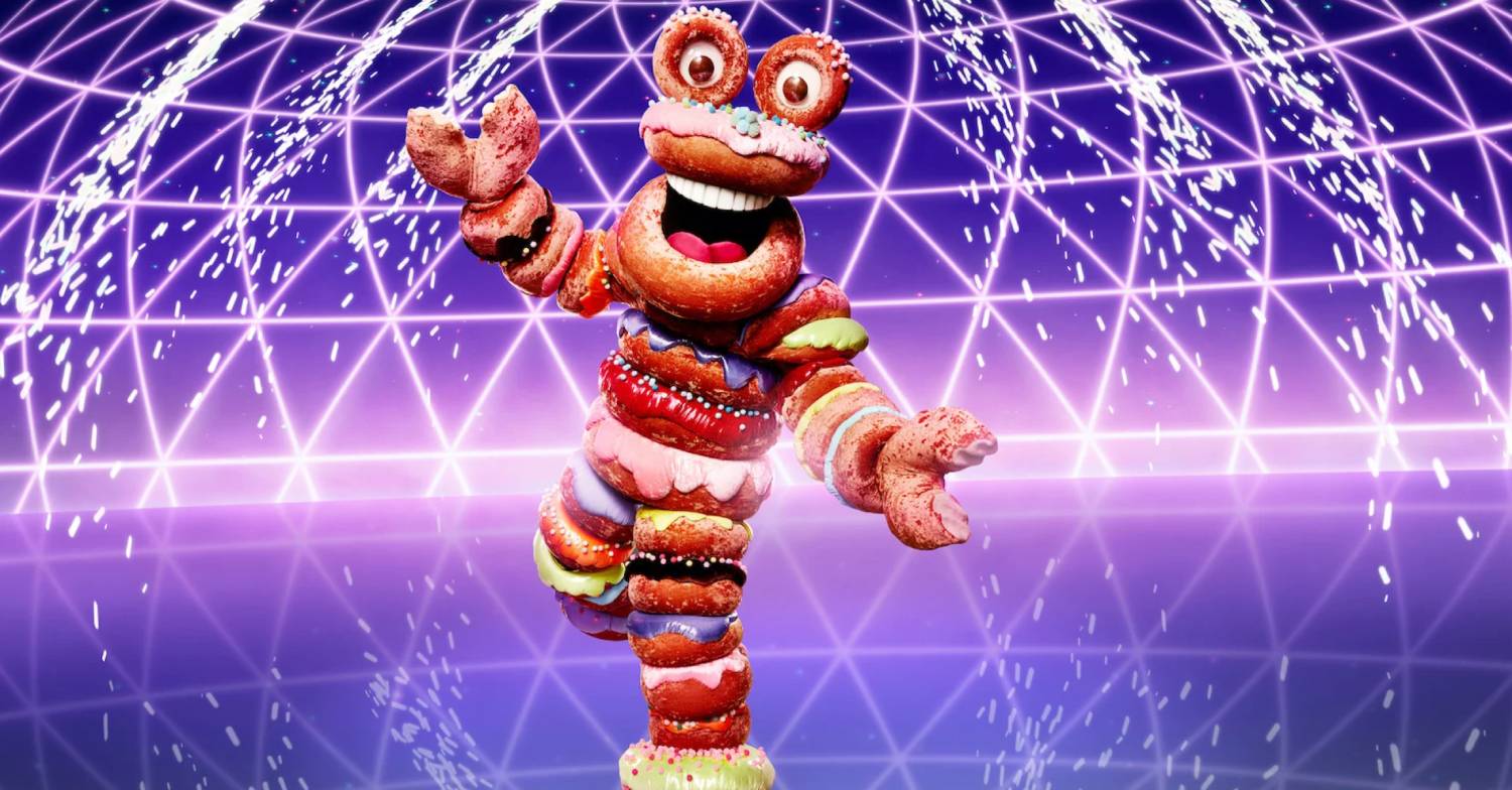 Jonathan Ross - and the other members of The Masked Singer 2022 panel - are entertained by Doughnuts