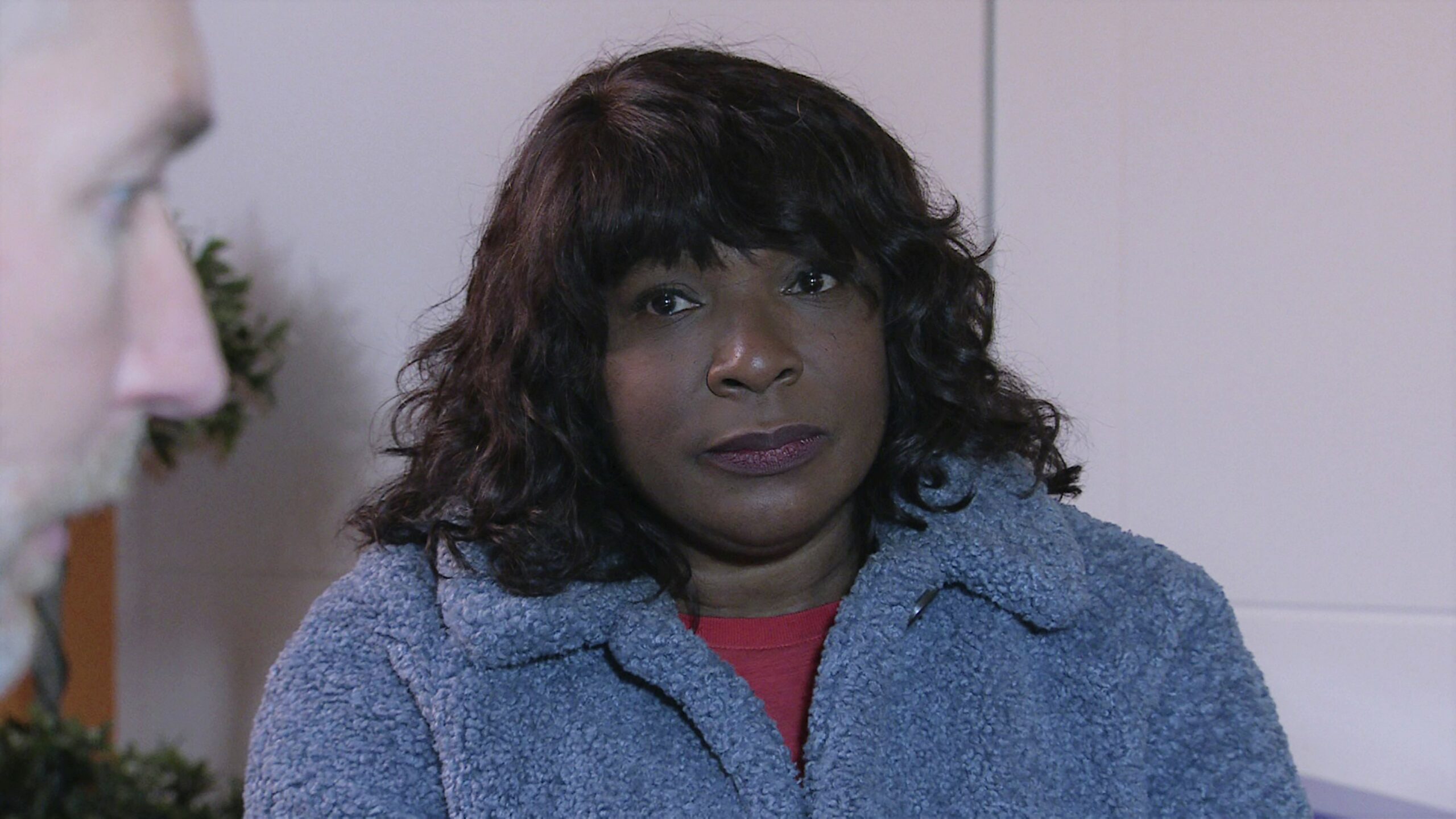 Aggie Bailey looks concerned at Tim's cardiology appointment