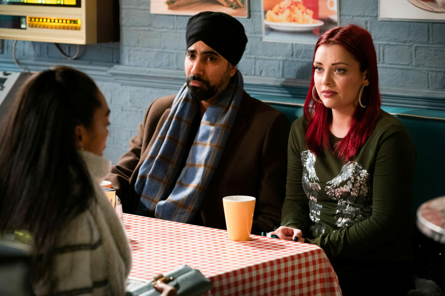 EastEnders Jan 17 2022 Chelsea is afraid in the cafe as she talks to Kheerat and Whitney