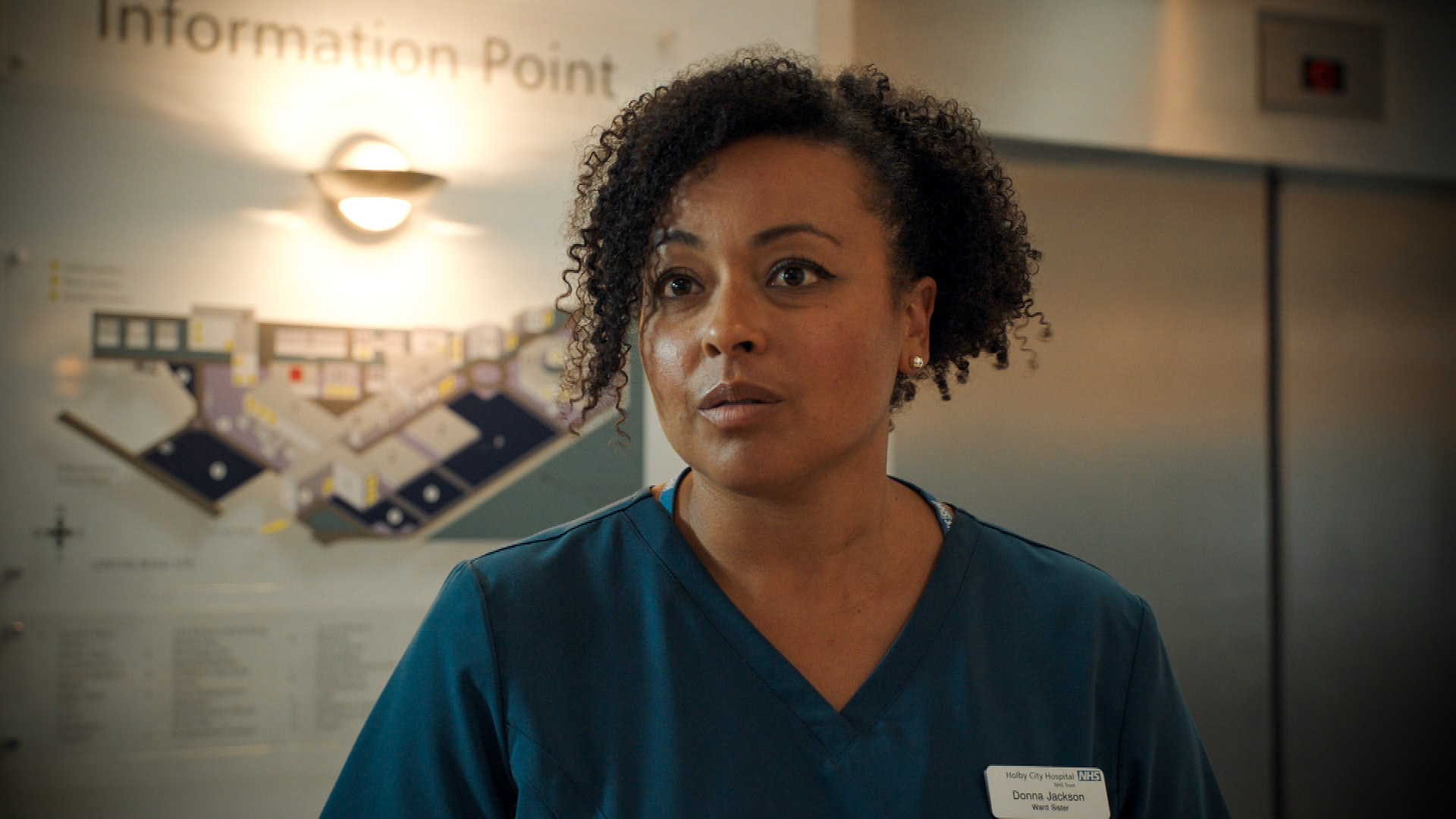 Donna Jackson looks concerned in Holby City