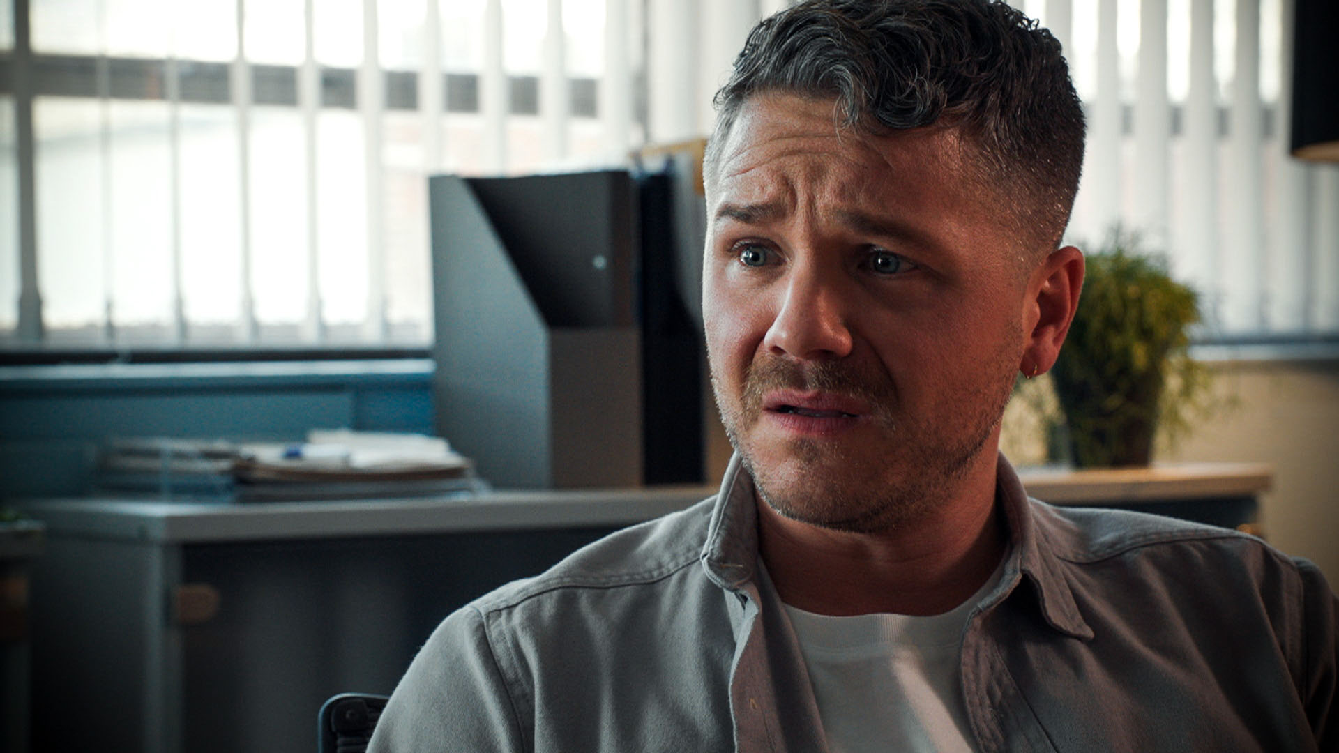 David Ames crying in Holby City