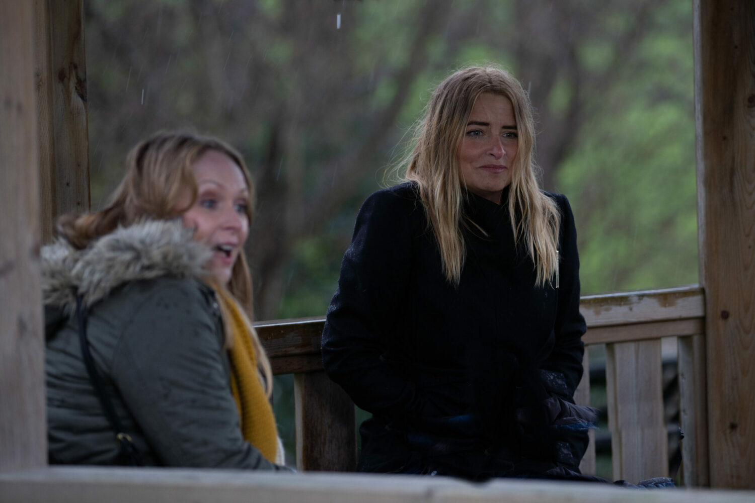 Emmerdale Vanessa and Charity are smiling outside together