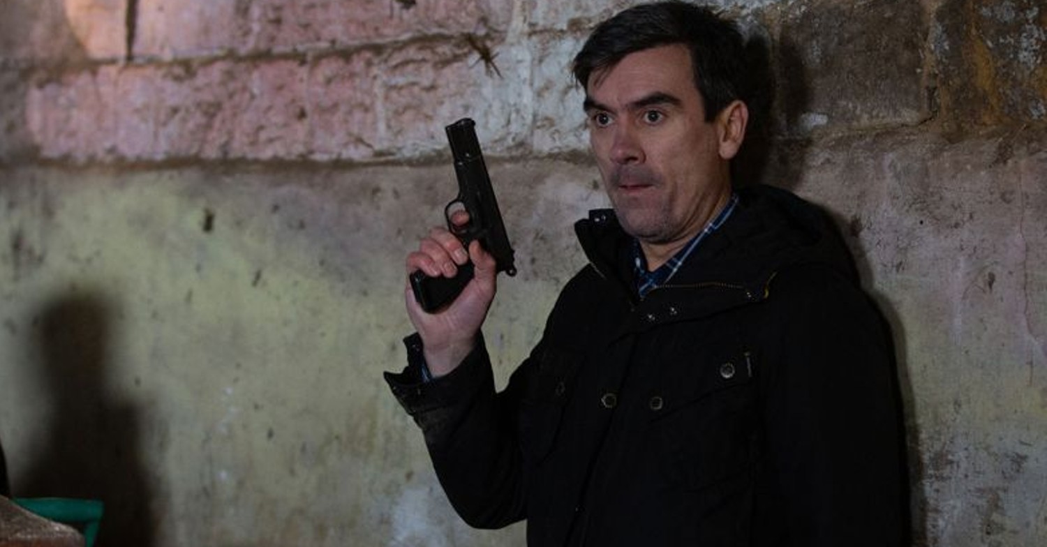 Liam Cavanagh asks Cain Dingle for a gun in Emmerdale next week to kill meena (Credit: ITV)