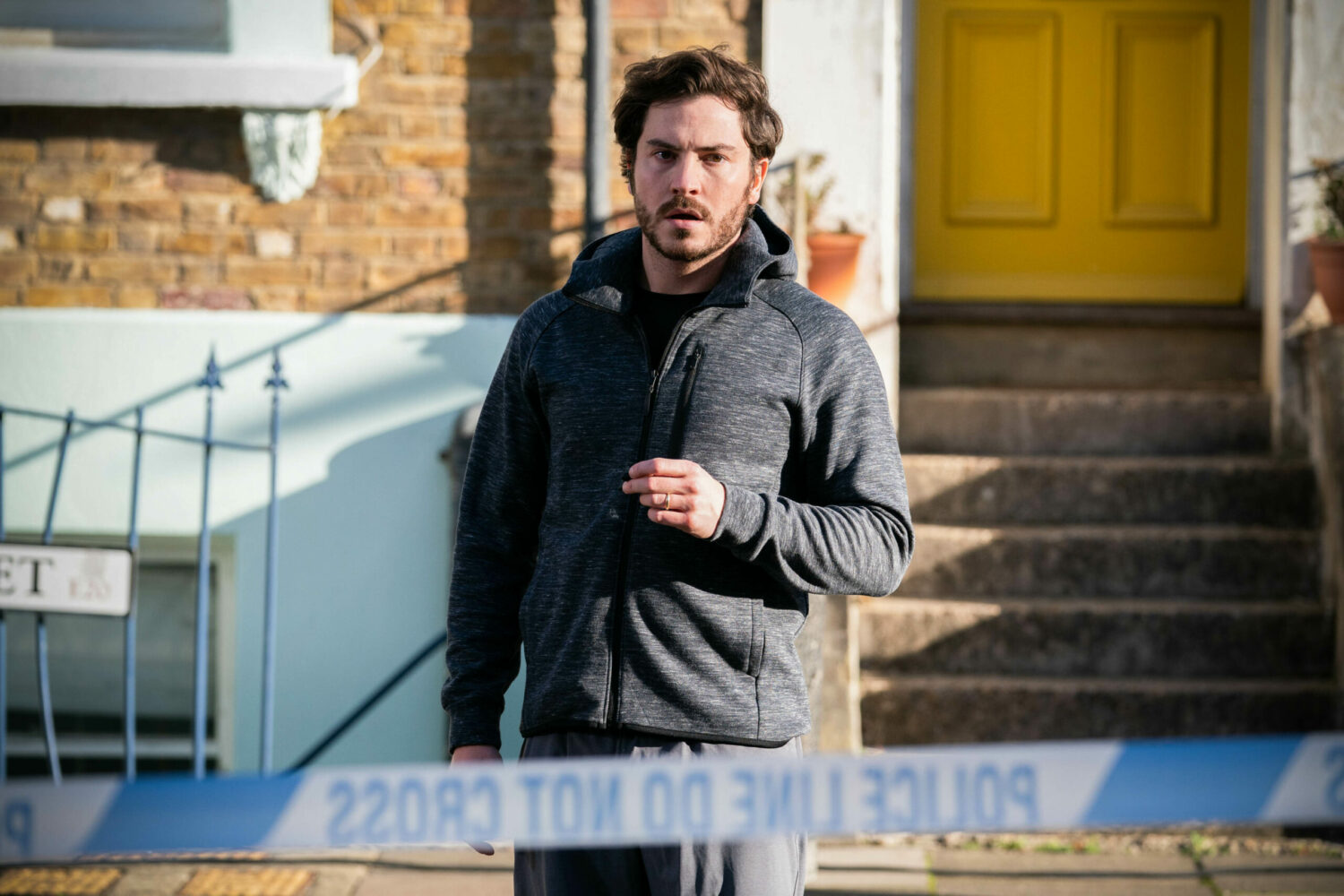 EastEnders Feb 7 Gray panics when he sees a cordoned off Argee Bhajee following the gas explosion.