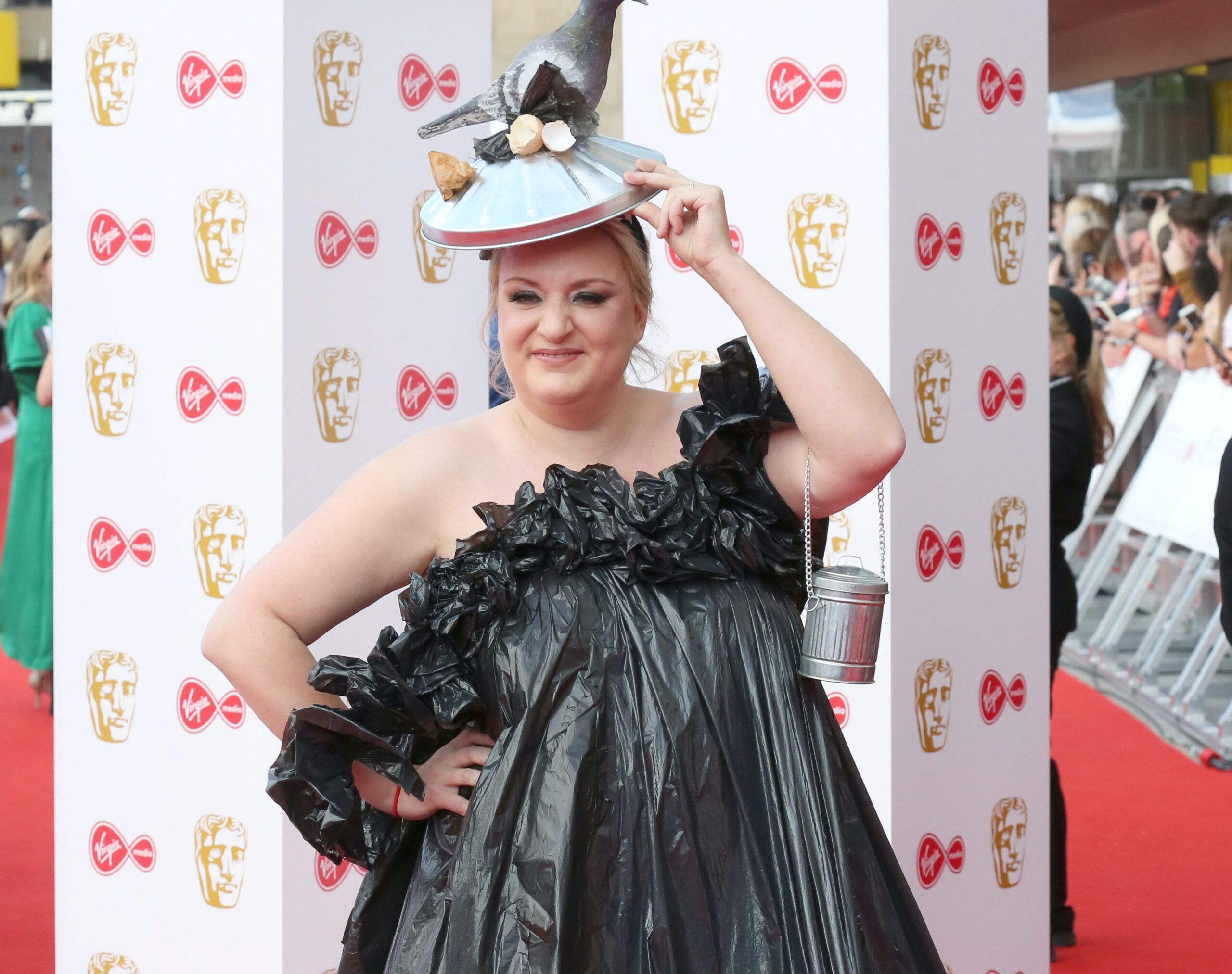 Daisy May Cooper has fun on the red carpet at the BAFTAs