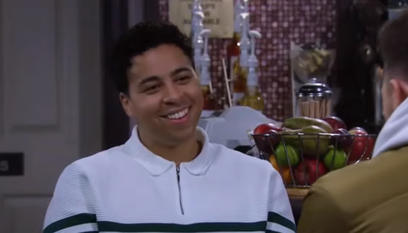 Emmerdale Ellis smiles as he talks to Billy in the cafe