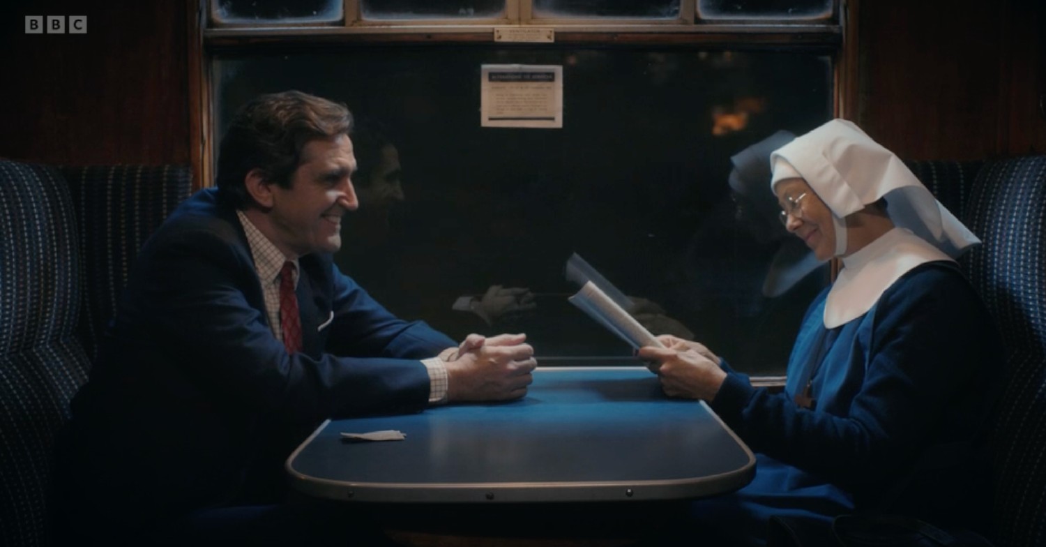 sister julienne and doctor turner on a train on call the midwife 