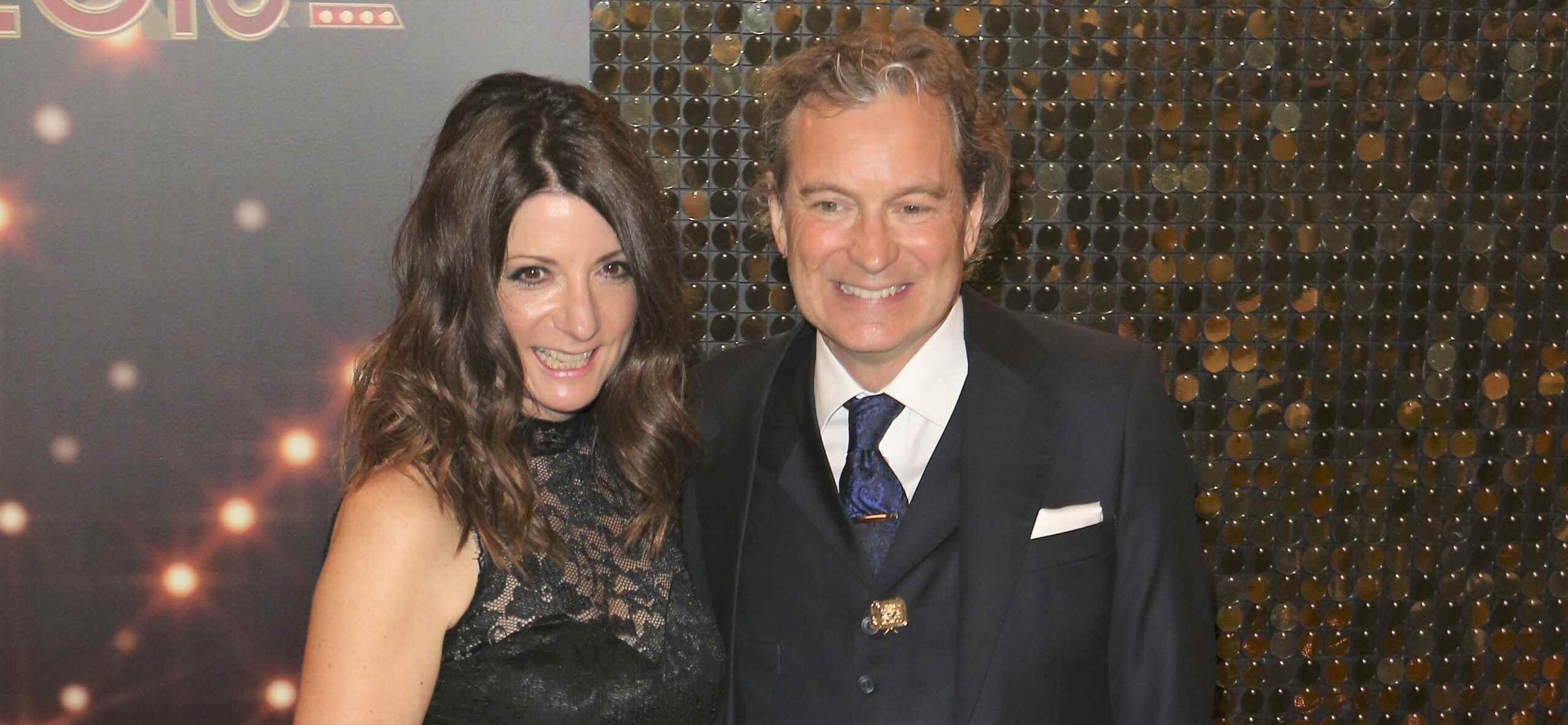 Katherine Dow Blyton and John Middleton pose on the red carpet