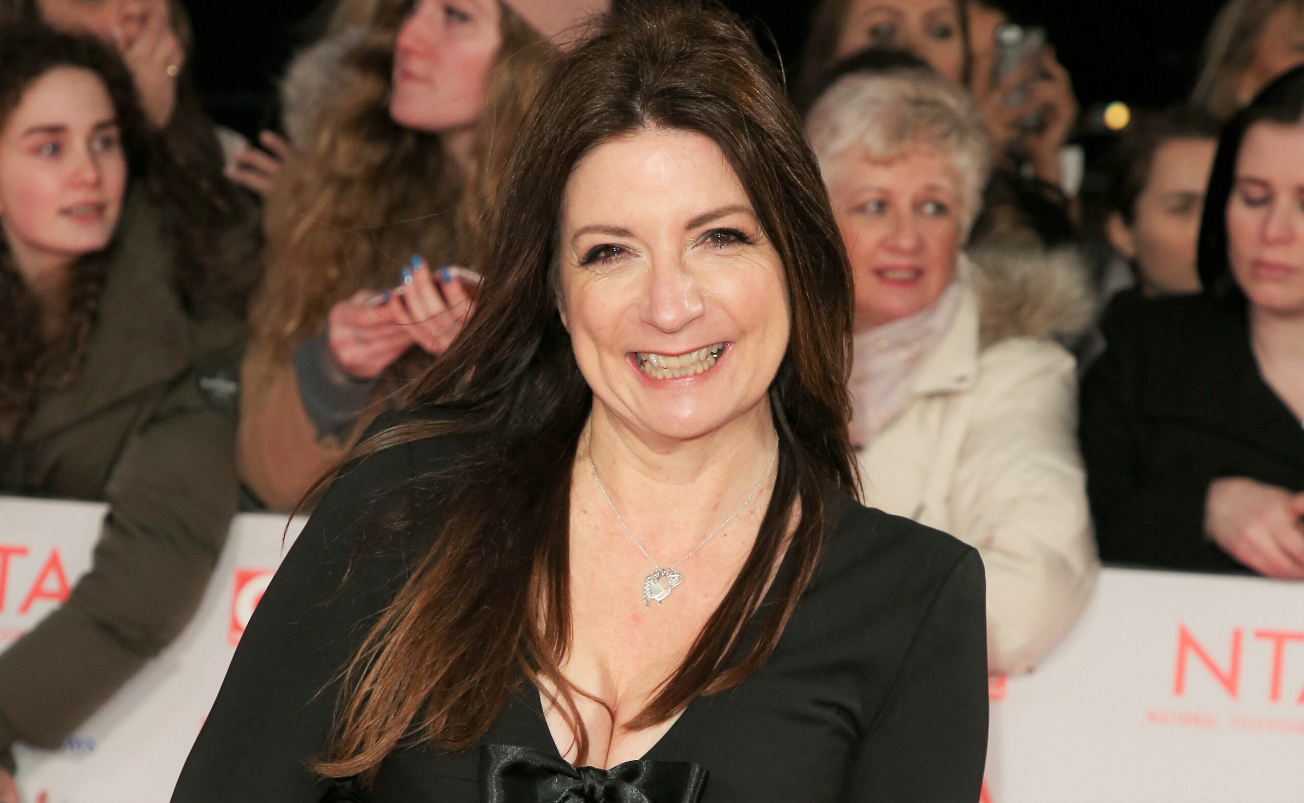 Katherine Dow Blyton on the red carpet smiling at the NTAs 2018