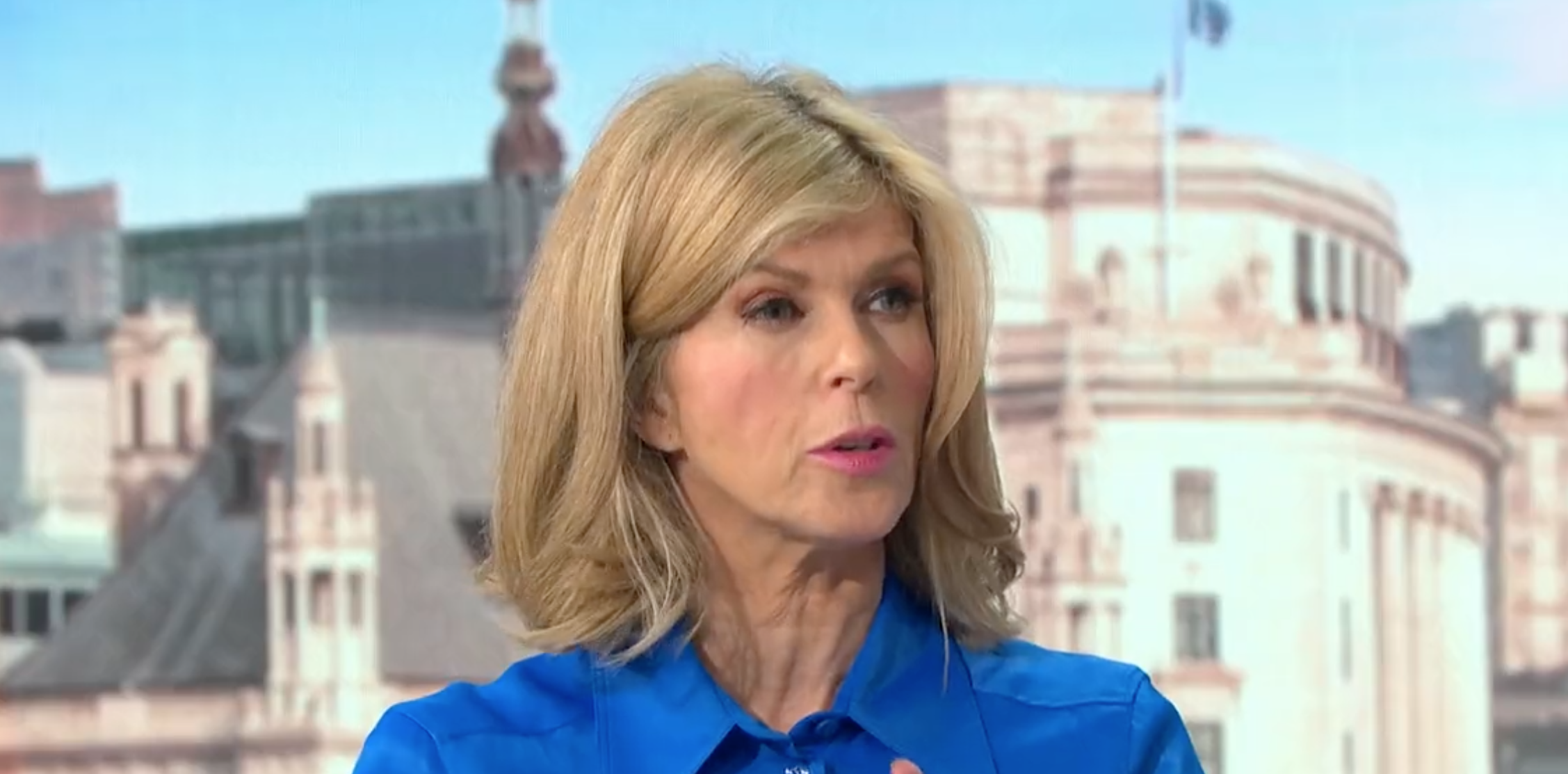 Kate Garraway wearing blue hosting GMB