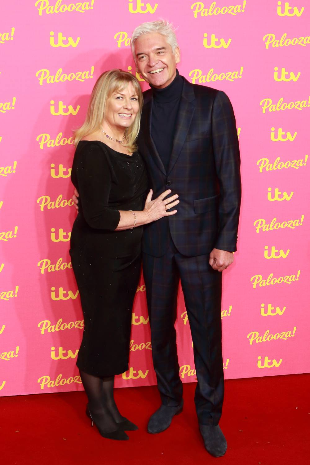 Phliip, pictured with wife Stephanie Lowe before he came out, dropped weight rapidly