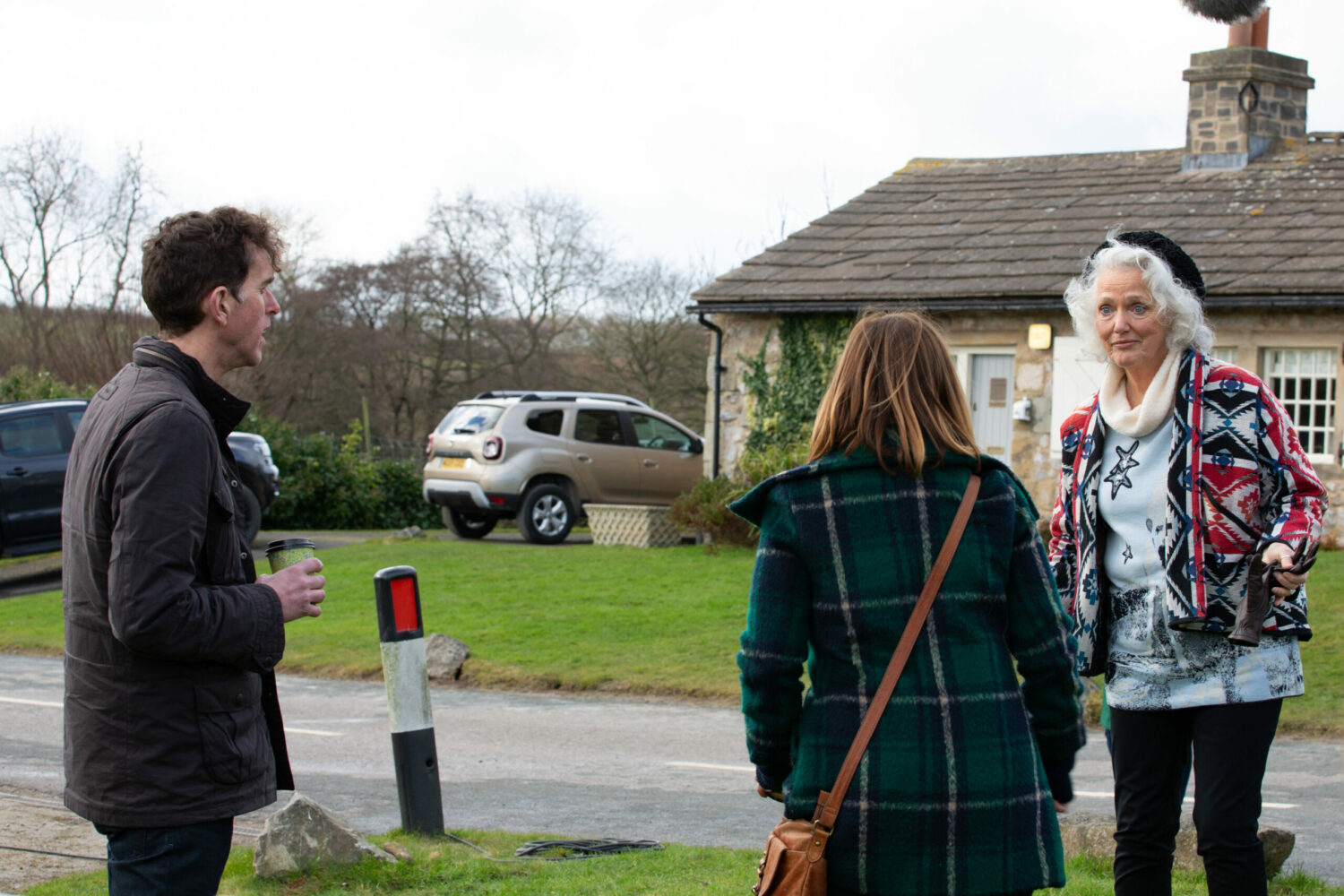 Rhona proposes to Marlon on one knee just as her mother arrives