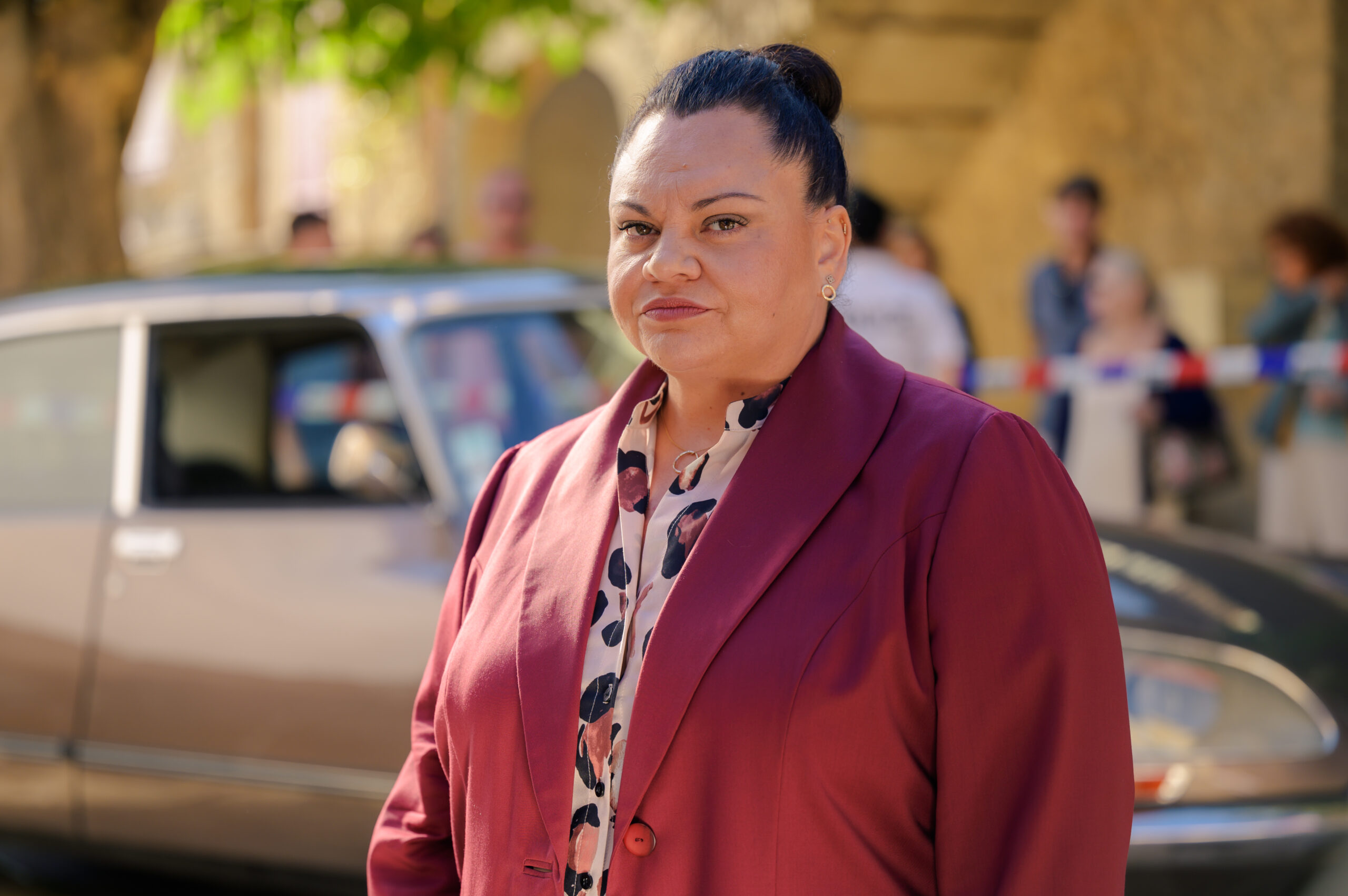 Keala Settle as Helene Paulik in Murder in Provence looking very fierce