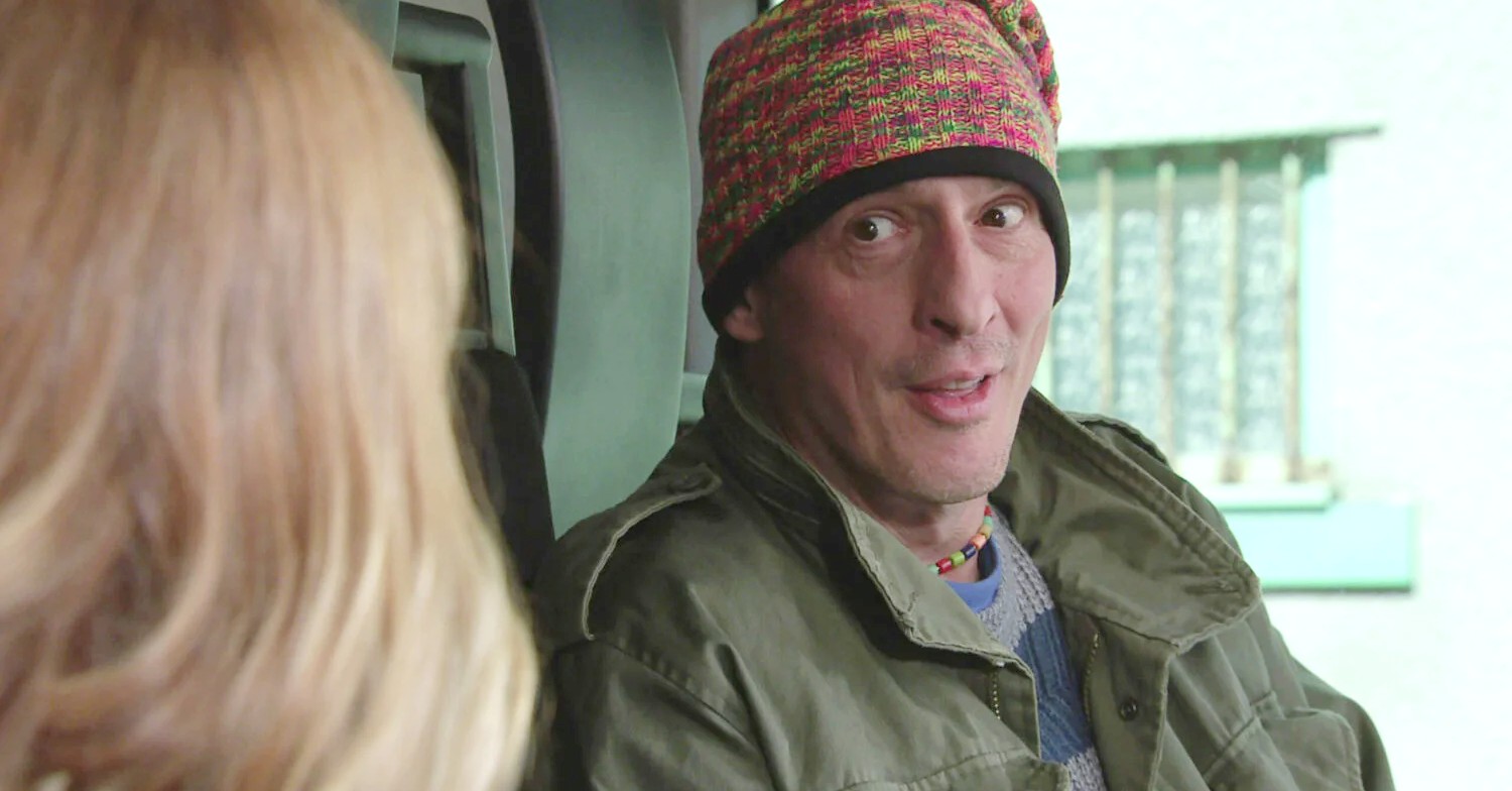 Coronation Street Spider smiles at Toyah in the bin lorry