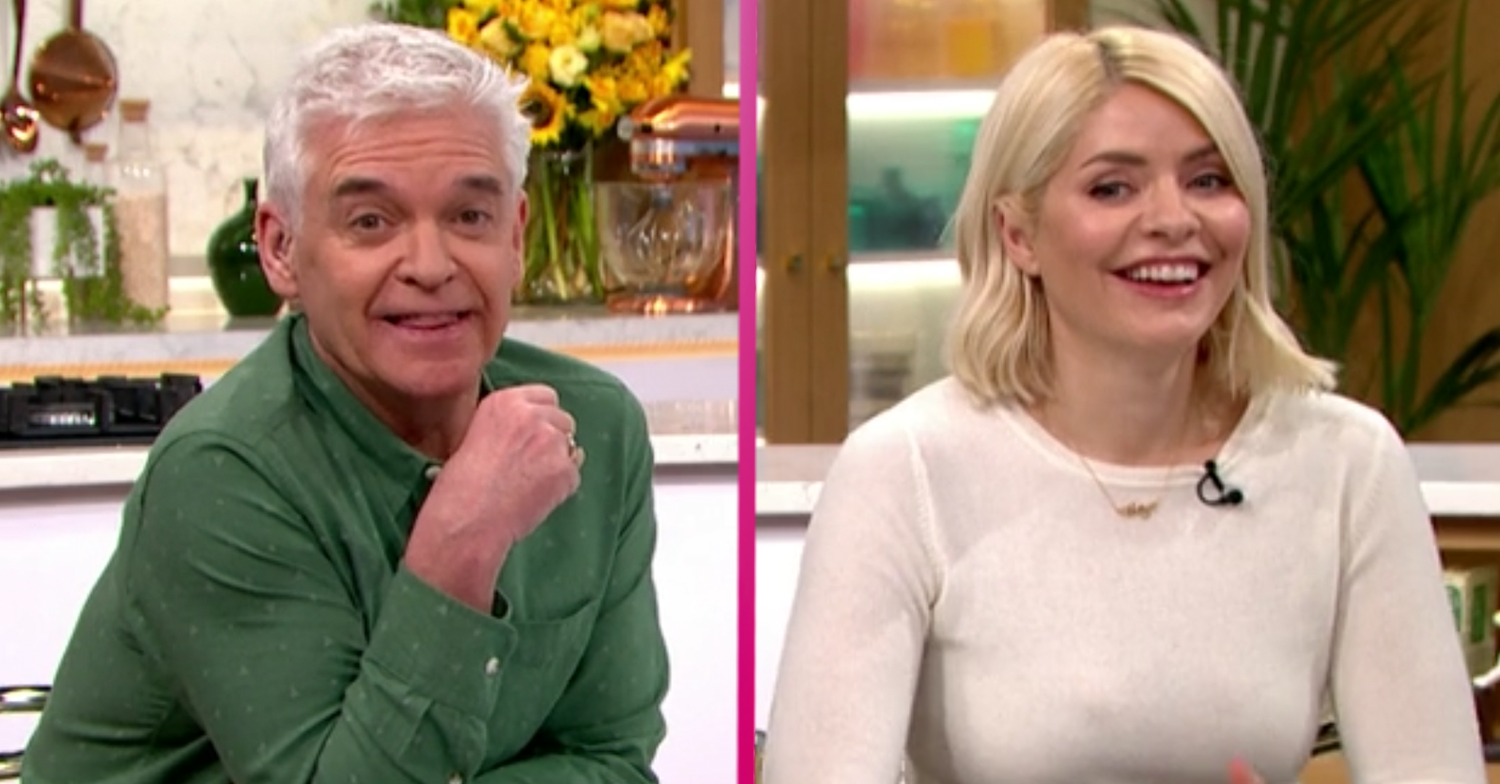 Holly Willoughby laughing with Phil on This Morning