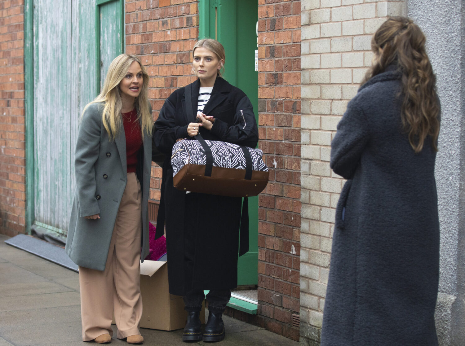 Coronation Street's Sarah and Bethany outside