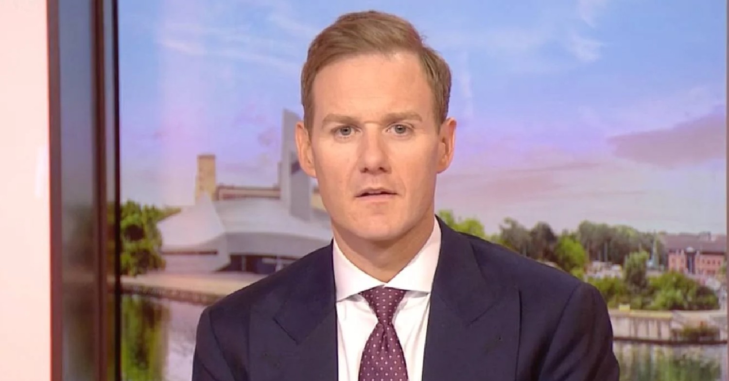 Dan Walker smiling as he hosts on BBC Breakfast