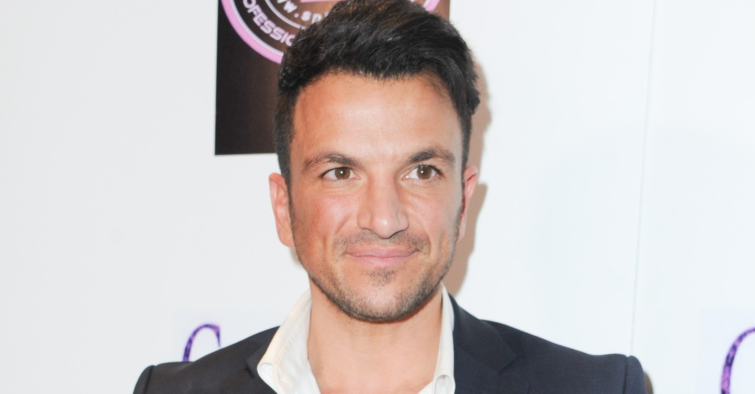 Peter Andre smiling at an event