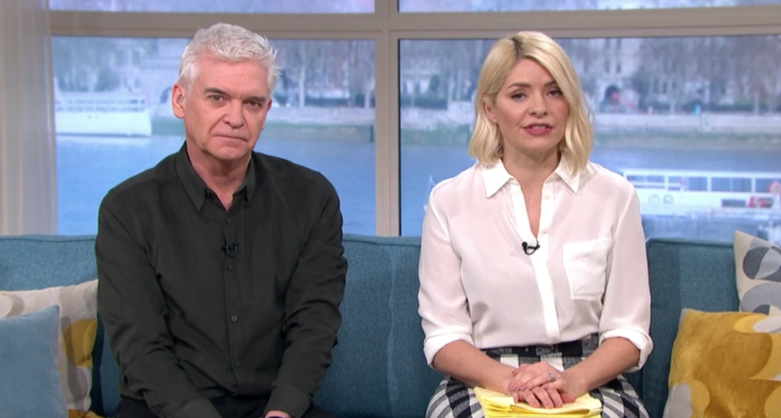 Phil and Holly looking serious on This morning