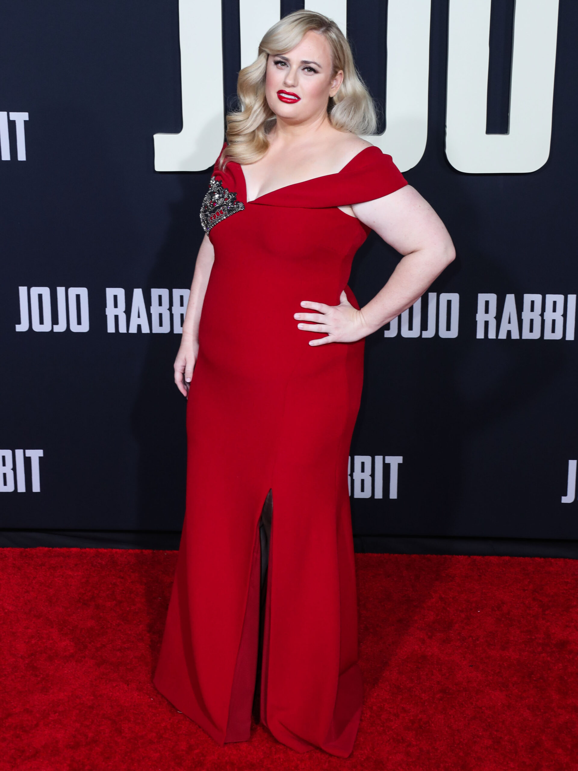 Rebel Wilson posing on the red carper for movie JoJo Rabbit